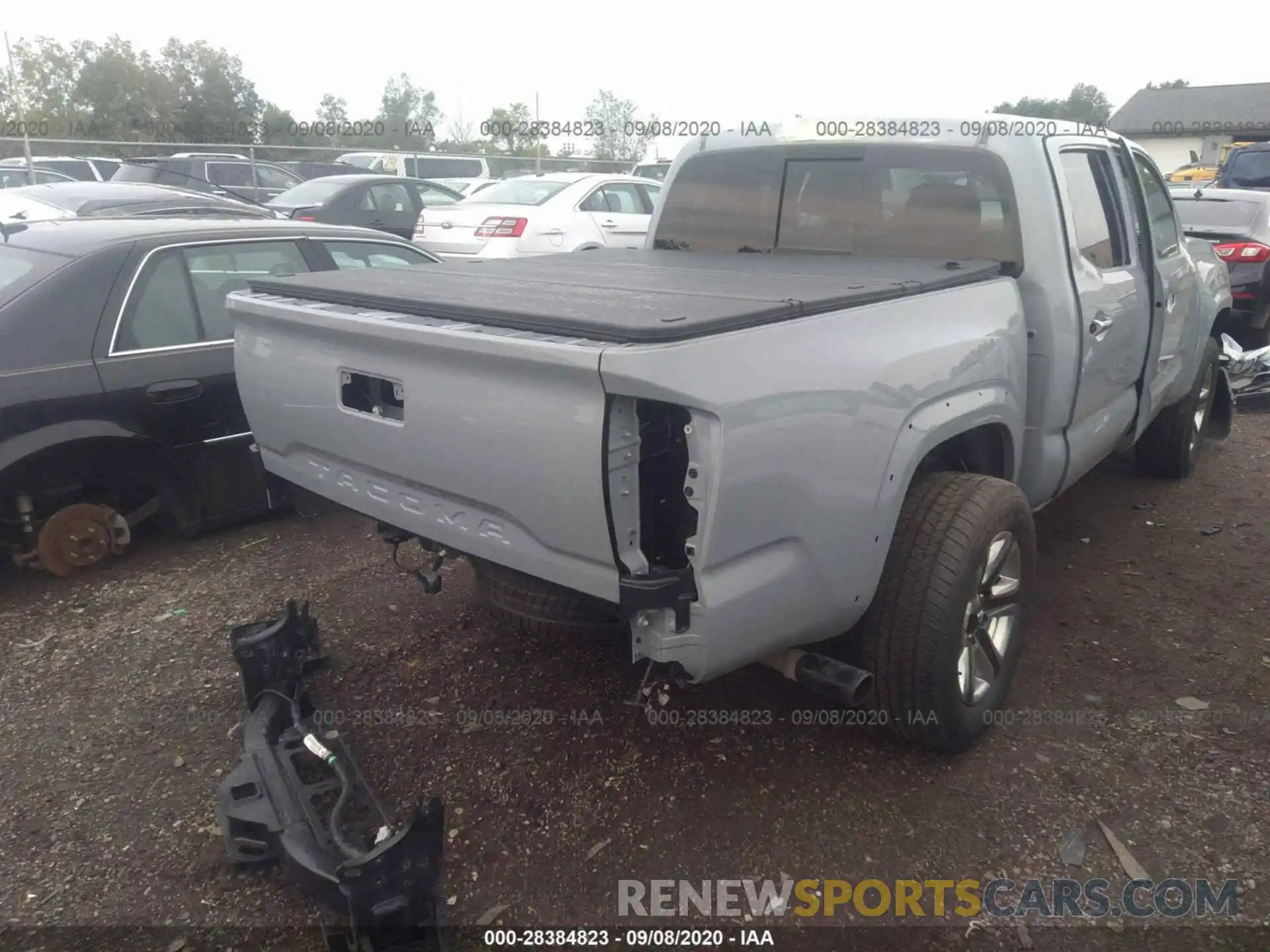 4 Photograph of a damaged car 3TMGZ5AN3KM241529 TOYOTA TACOMA 4WD 2019