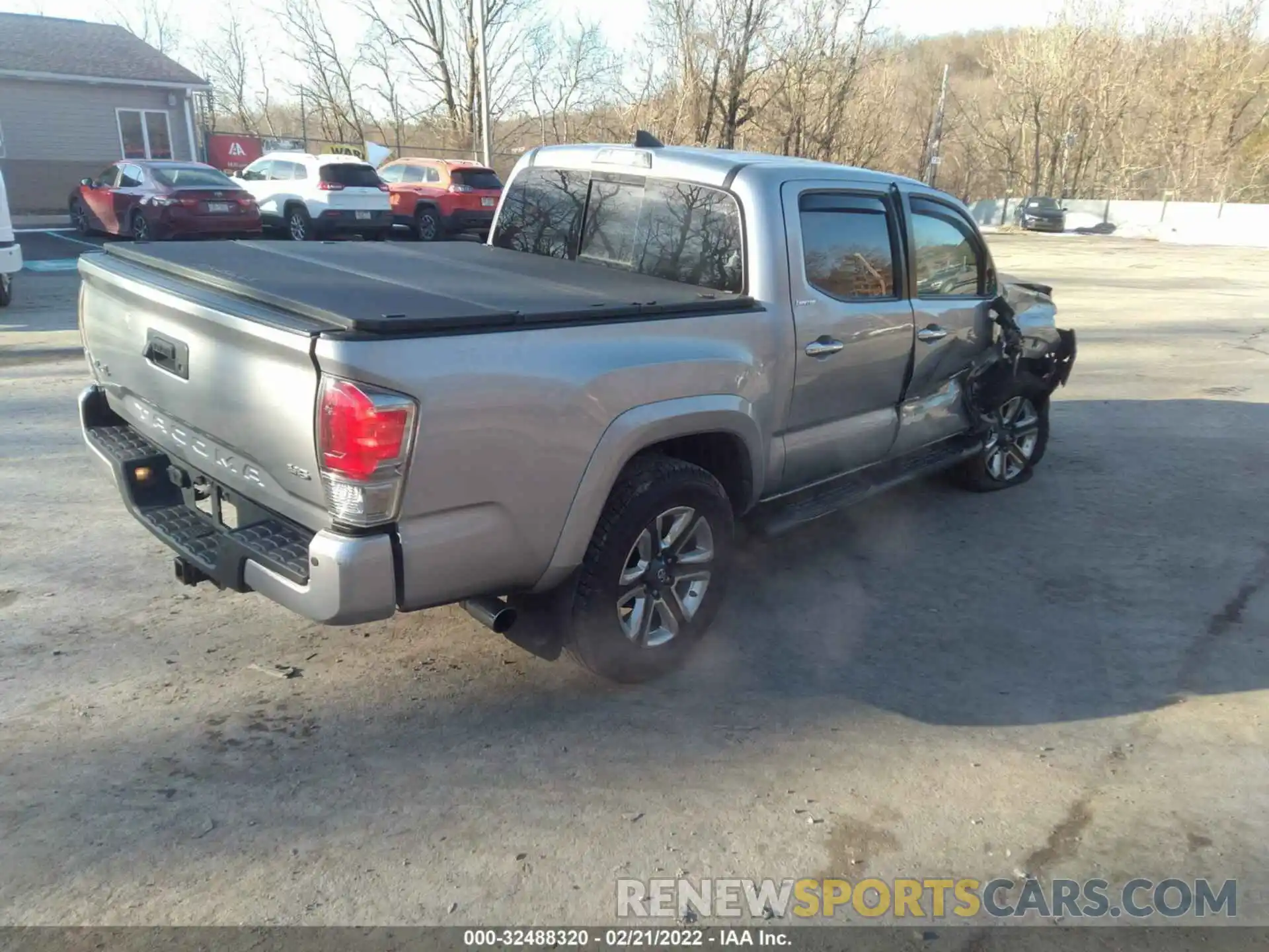 4 Photograph of a damaged car 3TMGZ5AN5KM261006 TOYOTA TACOMA 4WD 2019