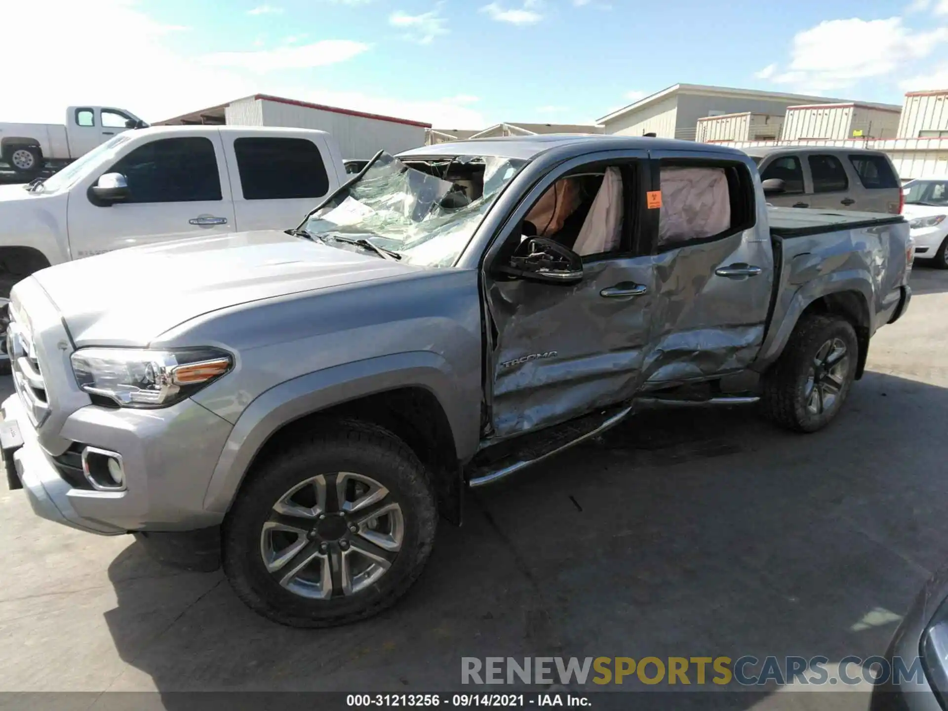 2 Photograph of a damaged car 3TMGZ5AN6KM212011 TOYOTA TACOMA 4WD 2019