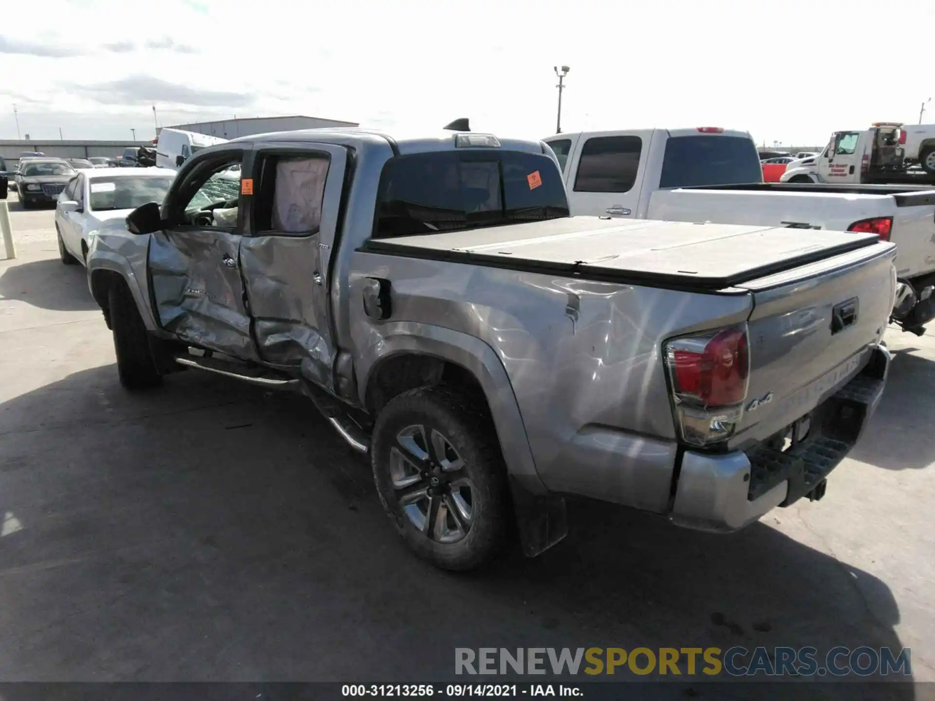 3 Photograph of a damaged car 3TMGZ5AN6KM212011 TOYOTA TACOMA 4WD 2019