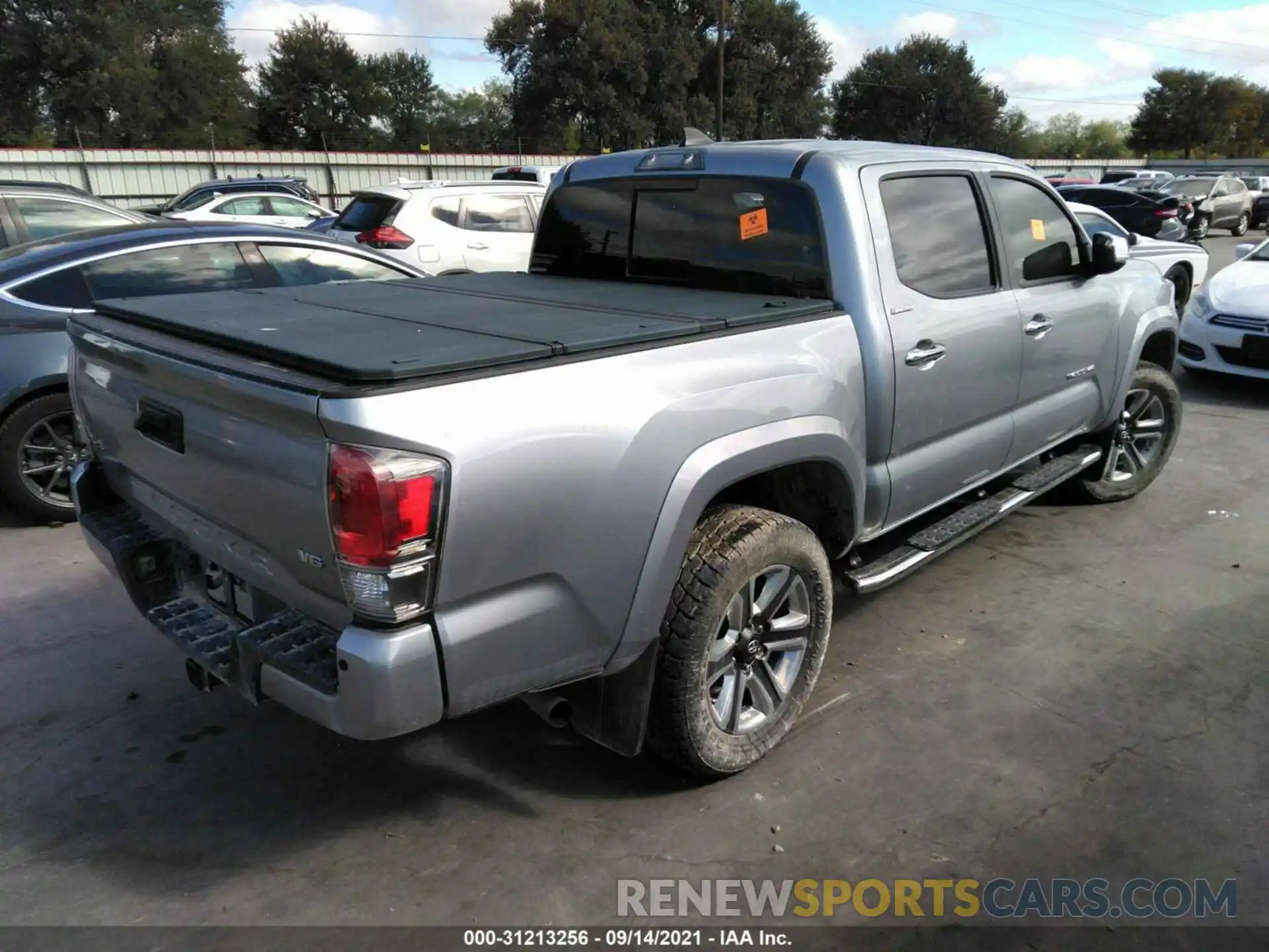 4 Photograph of a damaged car 3TMGZ5AN6KM212011 TOYOTA TACOMA 4WD 2019