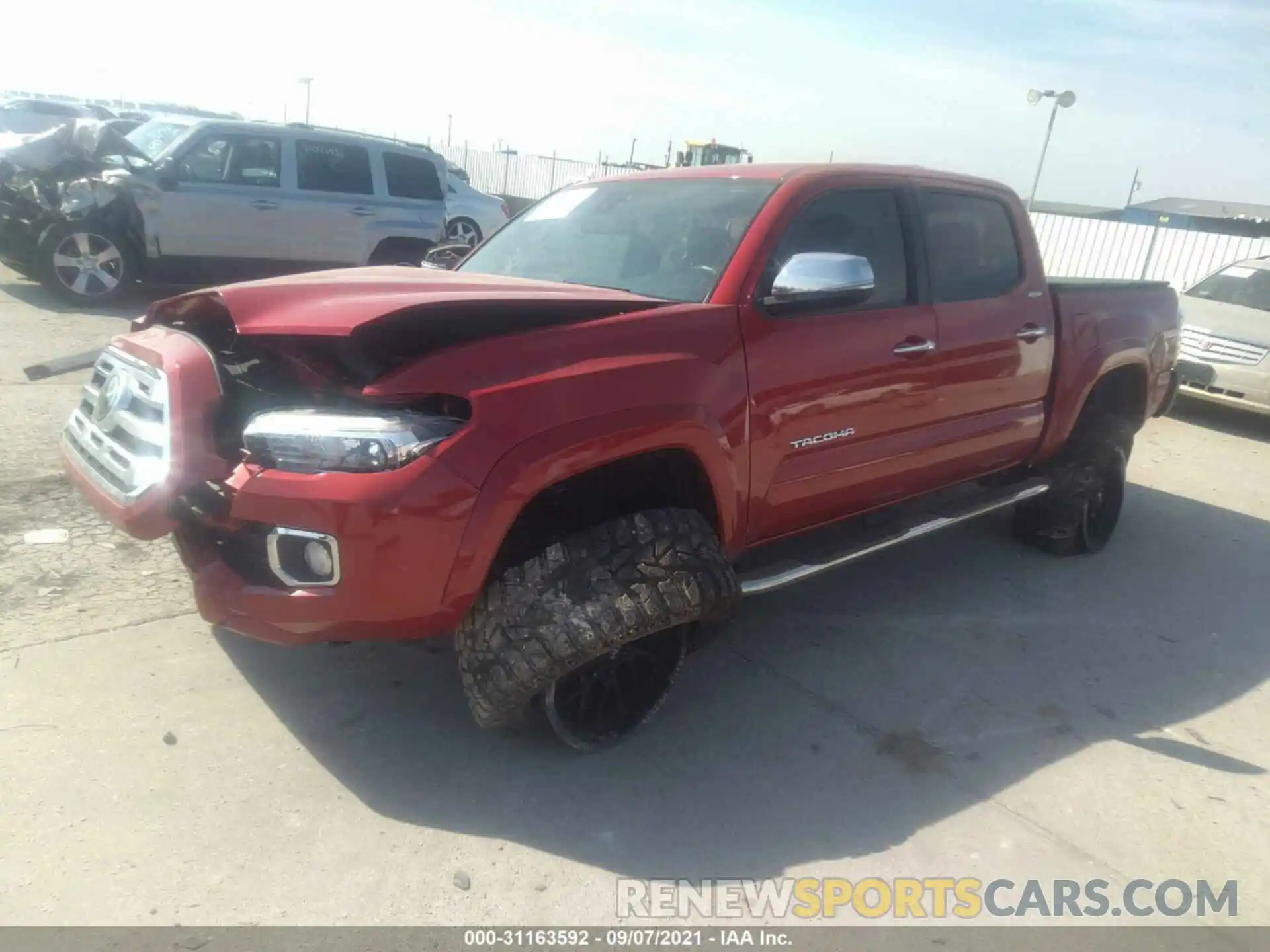 2 Photograph of a damaged car 3TMGZ5AN8KM209403 TOYOTA TACOMA 4WD 2019