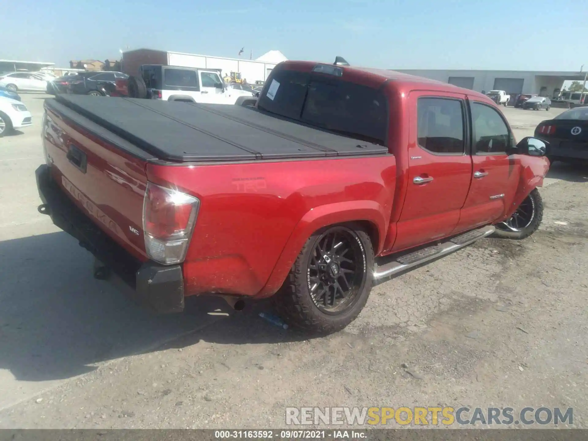 4 Photograph of a damaged car 3TMGZ5AN8KM209403 TOYOTA TACOMA 4WD 2019