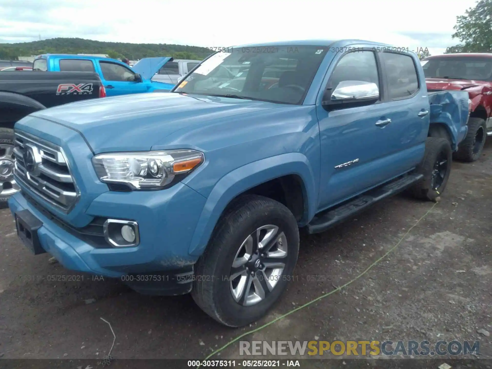 2 Photograph of a damaged car 3TMGZ5AN9KM199514 TOYOTA TACOMA 4WD 2019