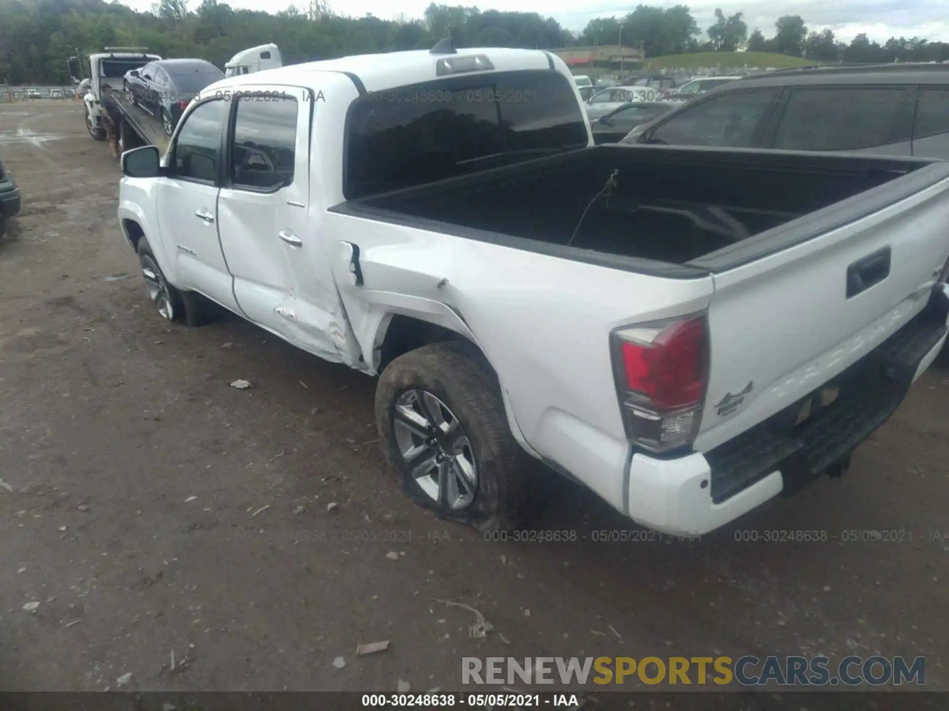 3 Photograph of a damaged car 3TMGZ5AN9KM214819 TOYOTA TACOMA 4WD 2019