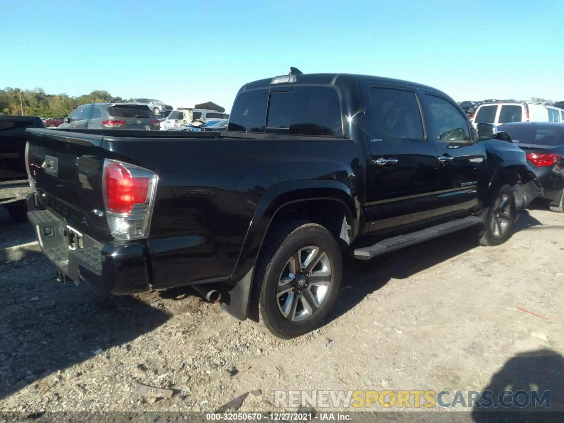 4 Photograph of a damaged car 3TMGZ5ANXKM239437 TOYOTA TACOMA 4WD 2019