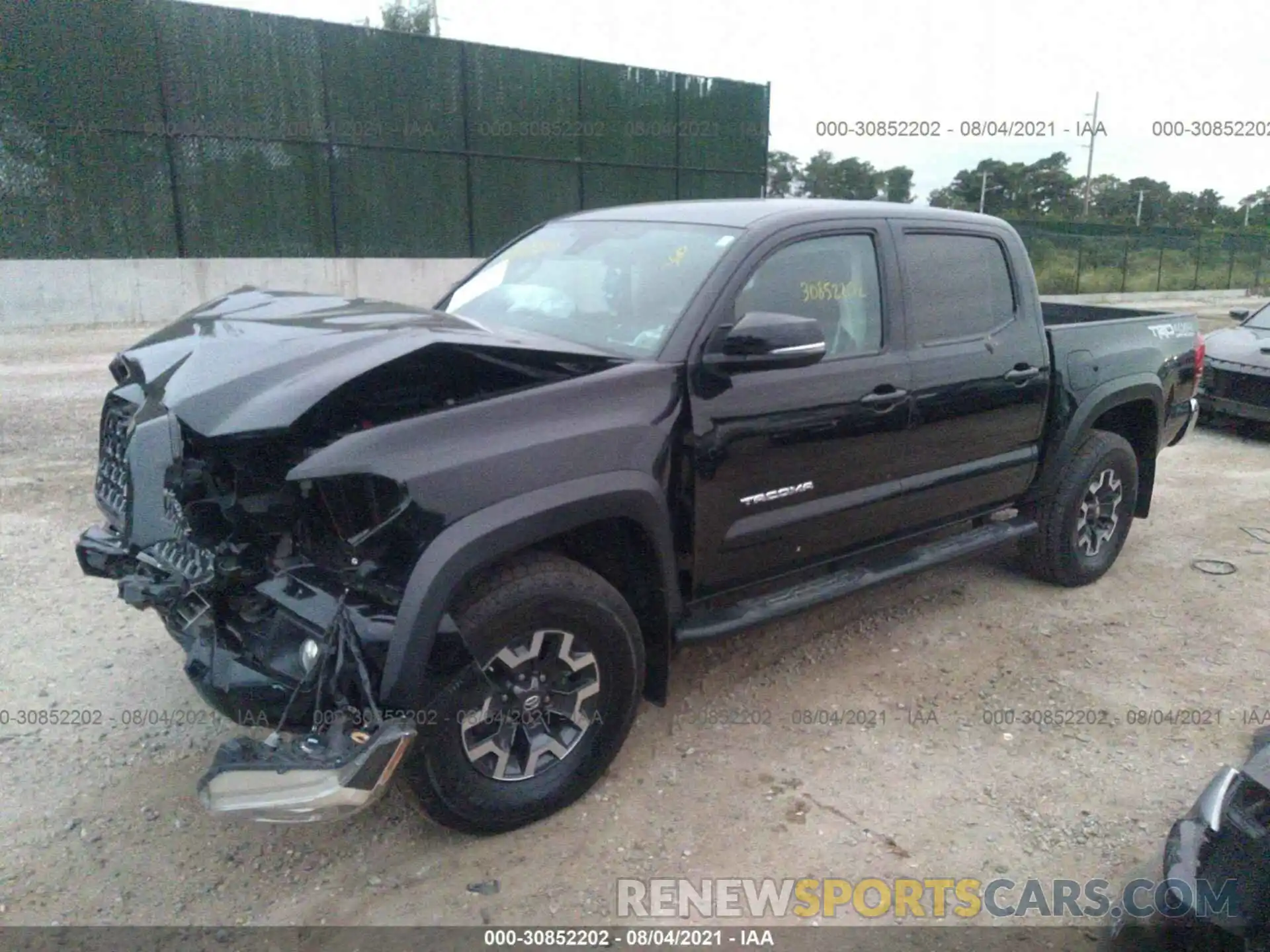 2 Photograph of a damaged car 5TFCZ5AN0KX174333 TOYOTA TACOMA 4WD 2019