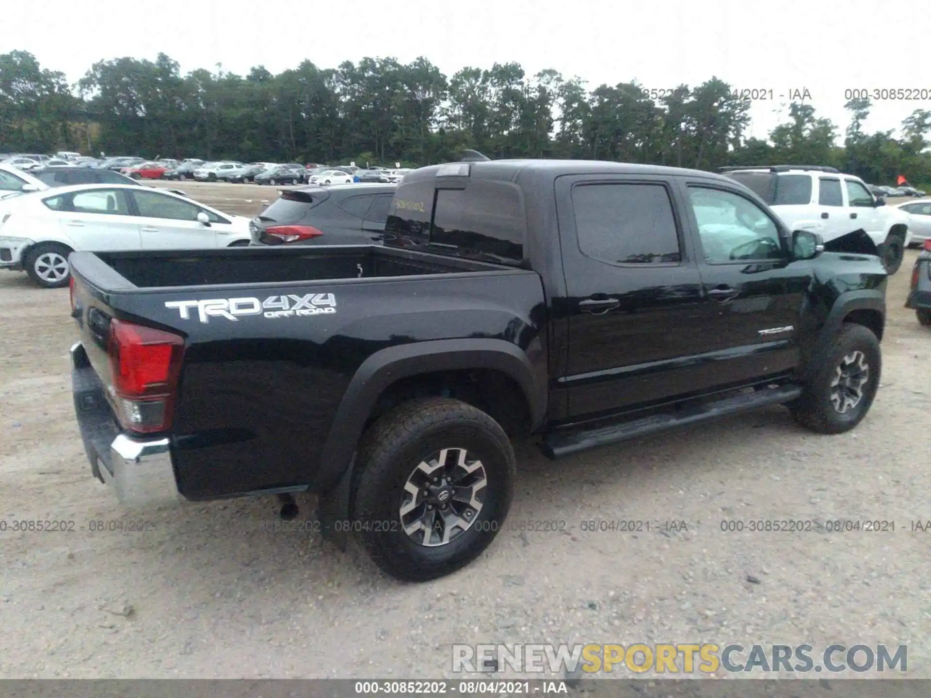 4 Photograph of a damaged car 5TFCZ5AN0KX174333 TOYOTA TACOMA 4WD 2019