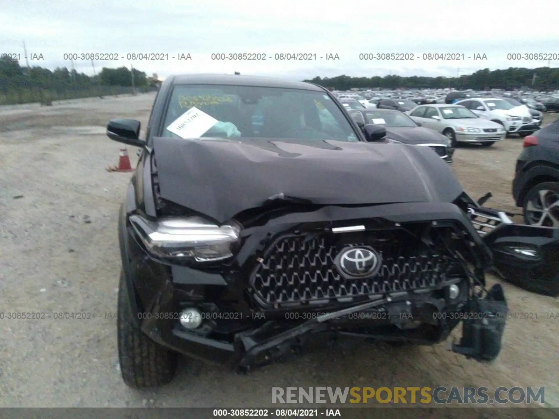 6 Photograph of a damaged car 5TFCZ5AN0KX174333 TOYOTA TACOMA 4WD 2019