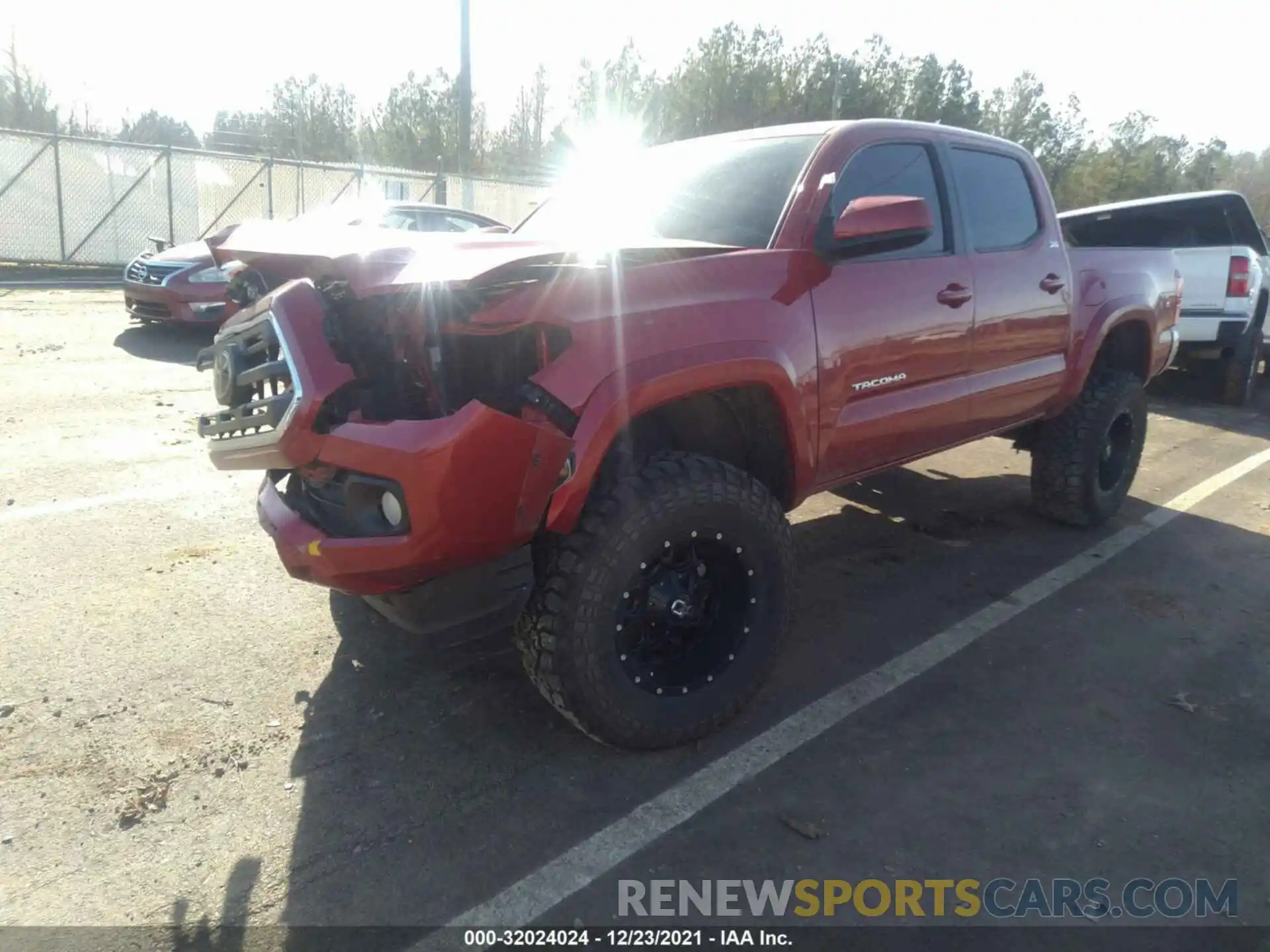 2 Photograph of a damaged car 5TFCZ5AN0KX184862 TOYOTA TACOMA 4WD 2019