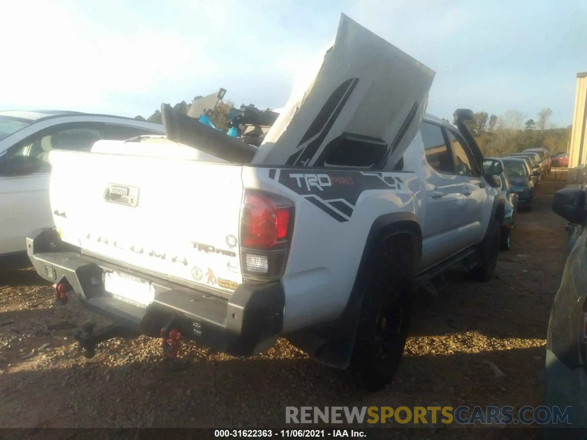 4 Photograph of a damaged car 5TFCZ5AN0KX193304 TOYOTA TACOMA 4WD 2019