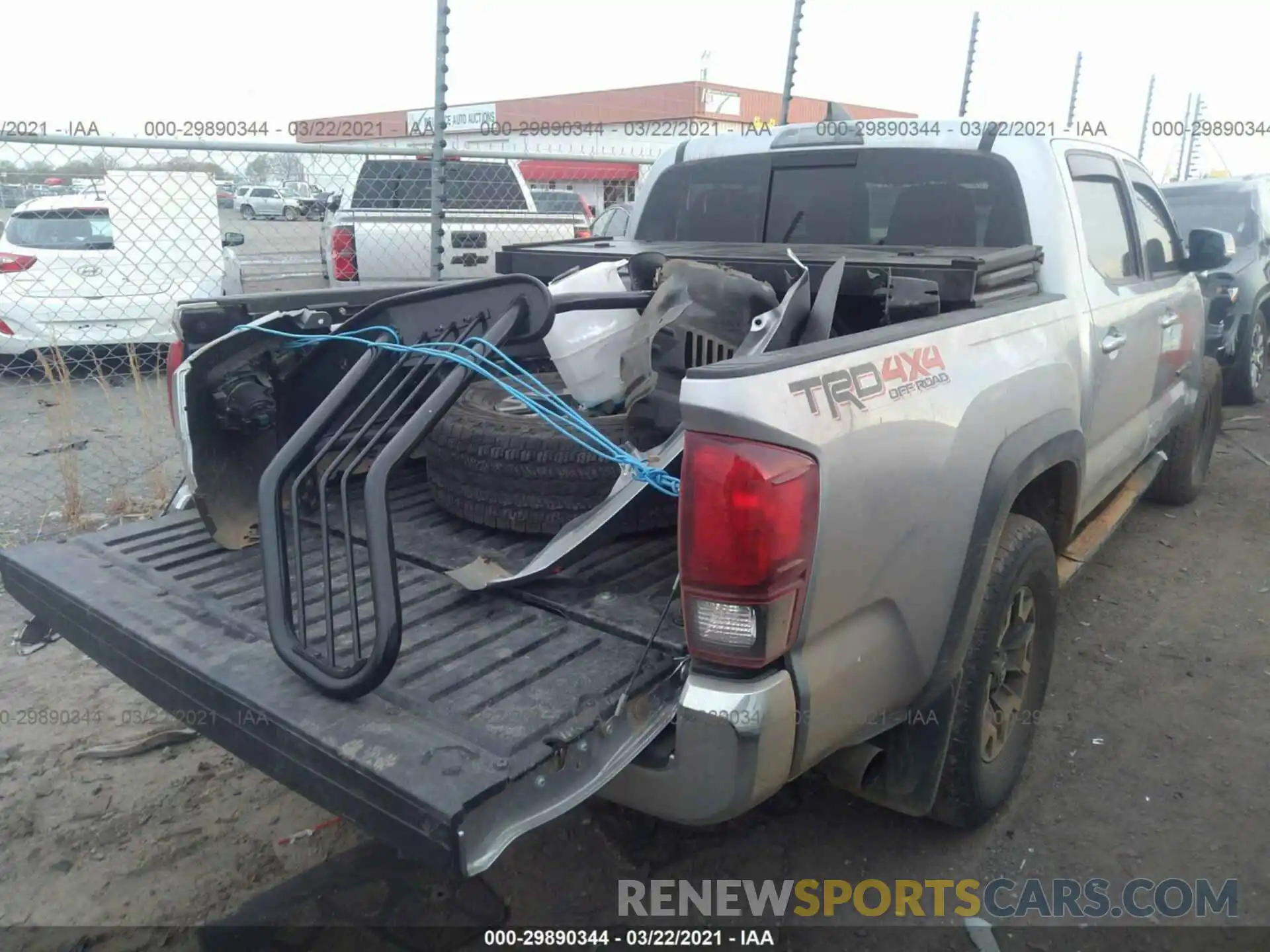 4 Photograph of a damaged car 5TFCZ5AN0KX194887 TOYOTA TACOMA 4WD 2019