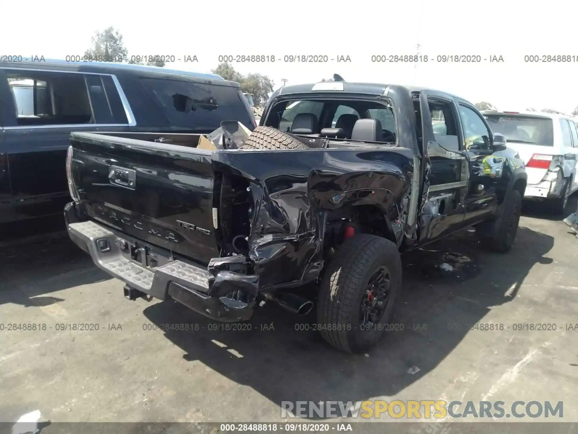 4 Photograph of a damaged car 5TFCZ5AN0KX199717 TOYOTA TACOMA 4WD 2019