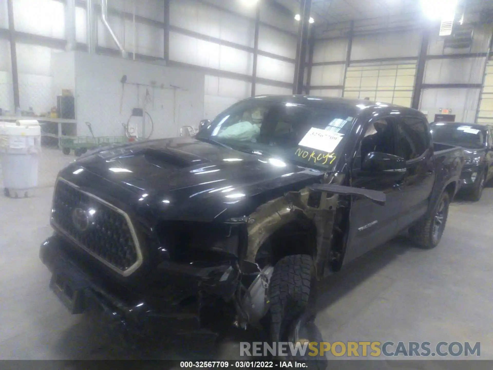 2 Photograph of a damaged car 5TFCZ5AN1KX169271 TOYOTA TACOMA 4WD 2019