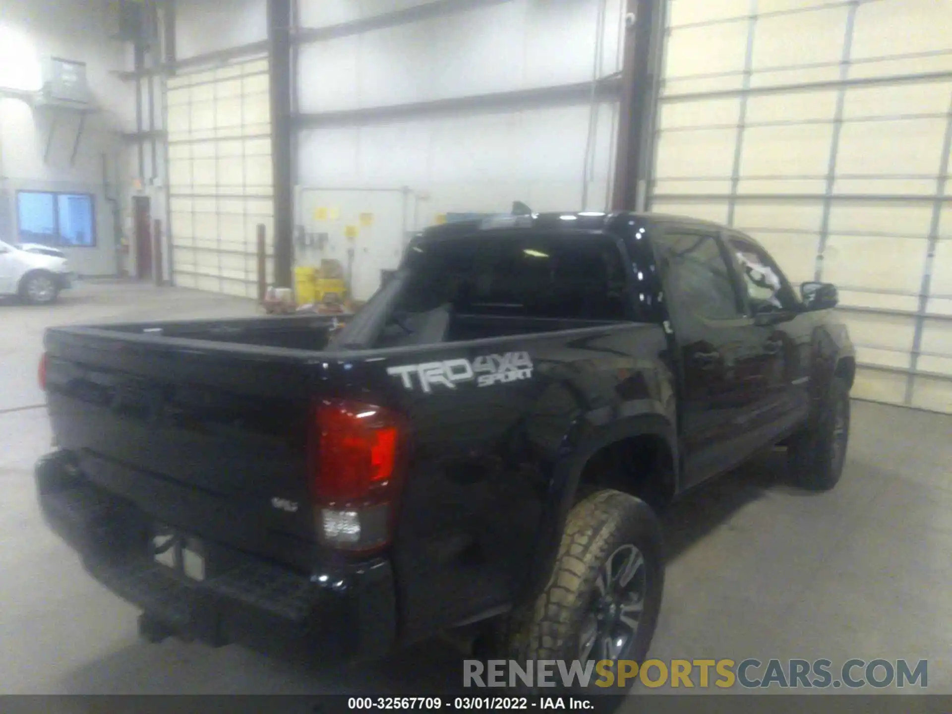 4 Photograph of a damaged car 5TFCZ5AN1KX169271 TOYOTA TACOMA 4WD 2019