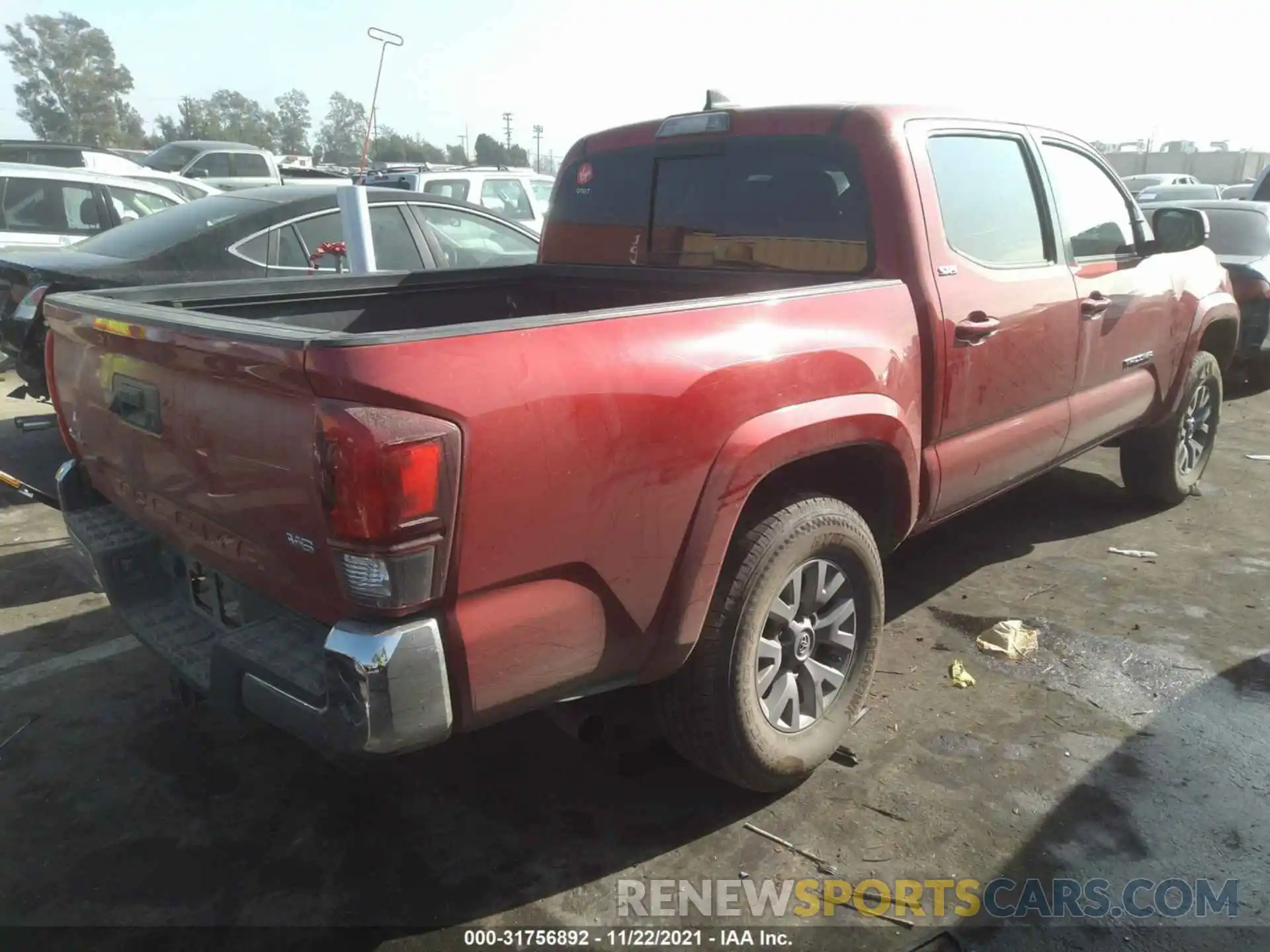 4 Photograph of a damaged car 5TFCZ5AN1KX171117 TOYOTA TACOMA 4WD 2019