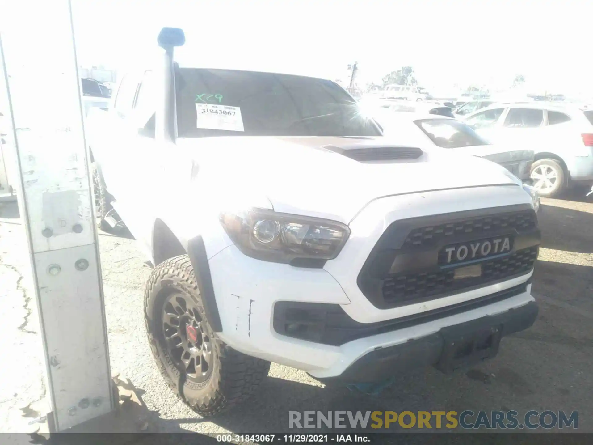 1 Photograph of a damaged car 5TFCZ5AN1KX174034 TOYOTA TACOMA 4WD 2019