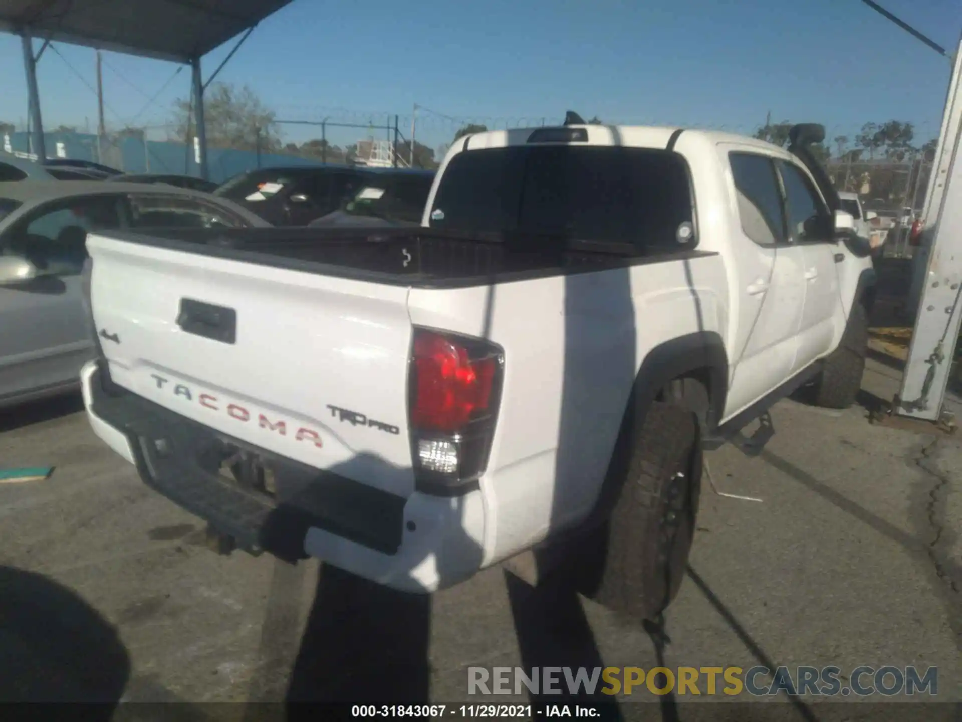 4 Photograph of a damaged car 5TFCZ5AN1KX174034 TOYOTA TACOMA 4WD 2019