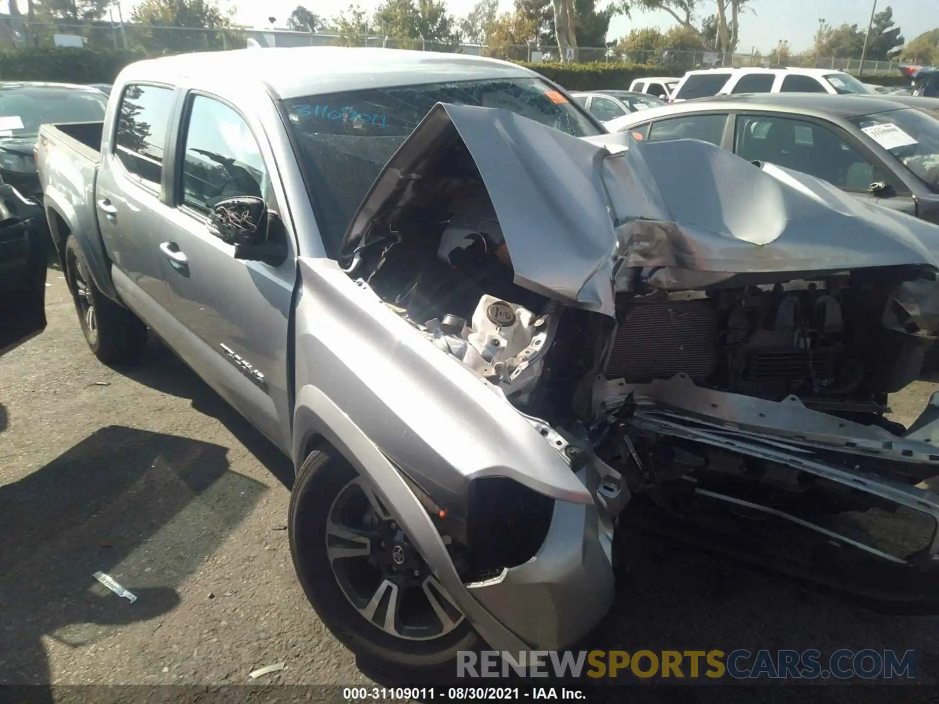 1 Photograph of a damaged car 5TFCZ5AN1KX193425 TOYOTA TACOMA 4WD 2019