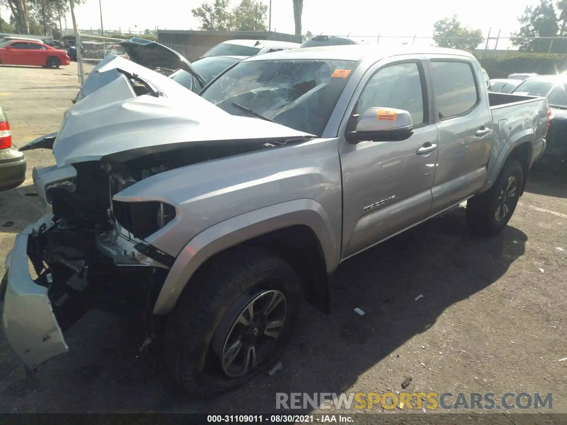 2 Photograph of a damaged car 5TFCZ5AN1KX193425 TOYOTA TACOMA 4WD 2019