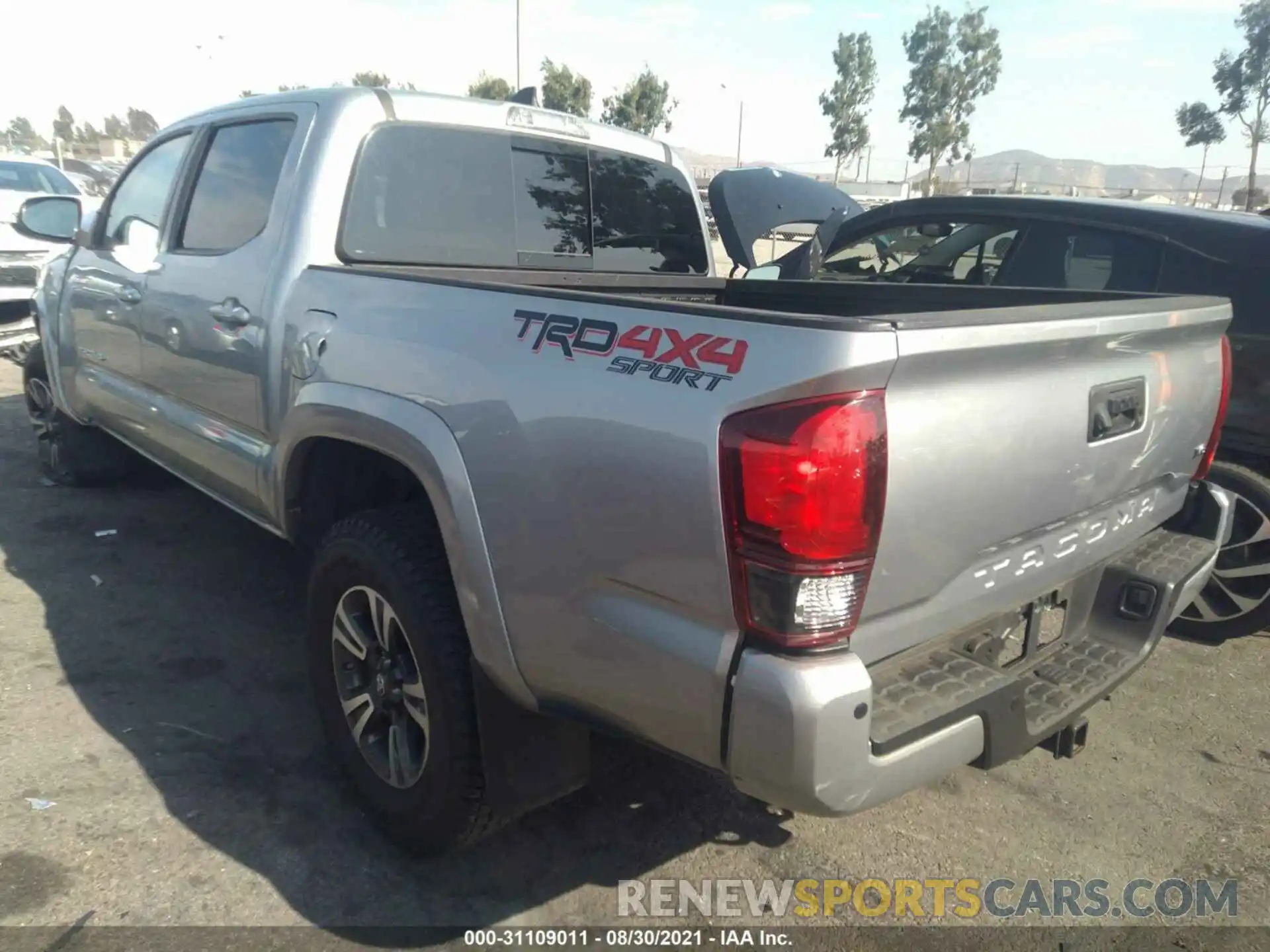 3 Photograph of a damaged car 5TFCZ5AN1KX193425 TOYOTA TACOMA 4WD 2019