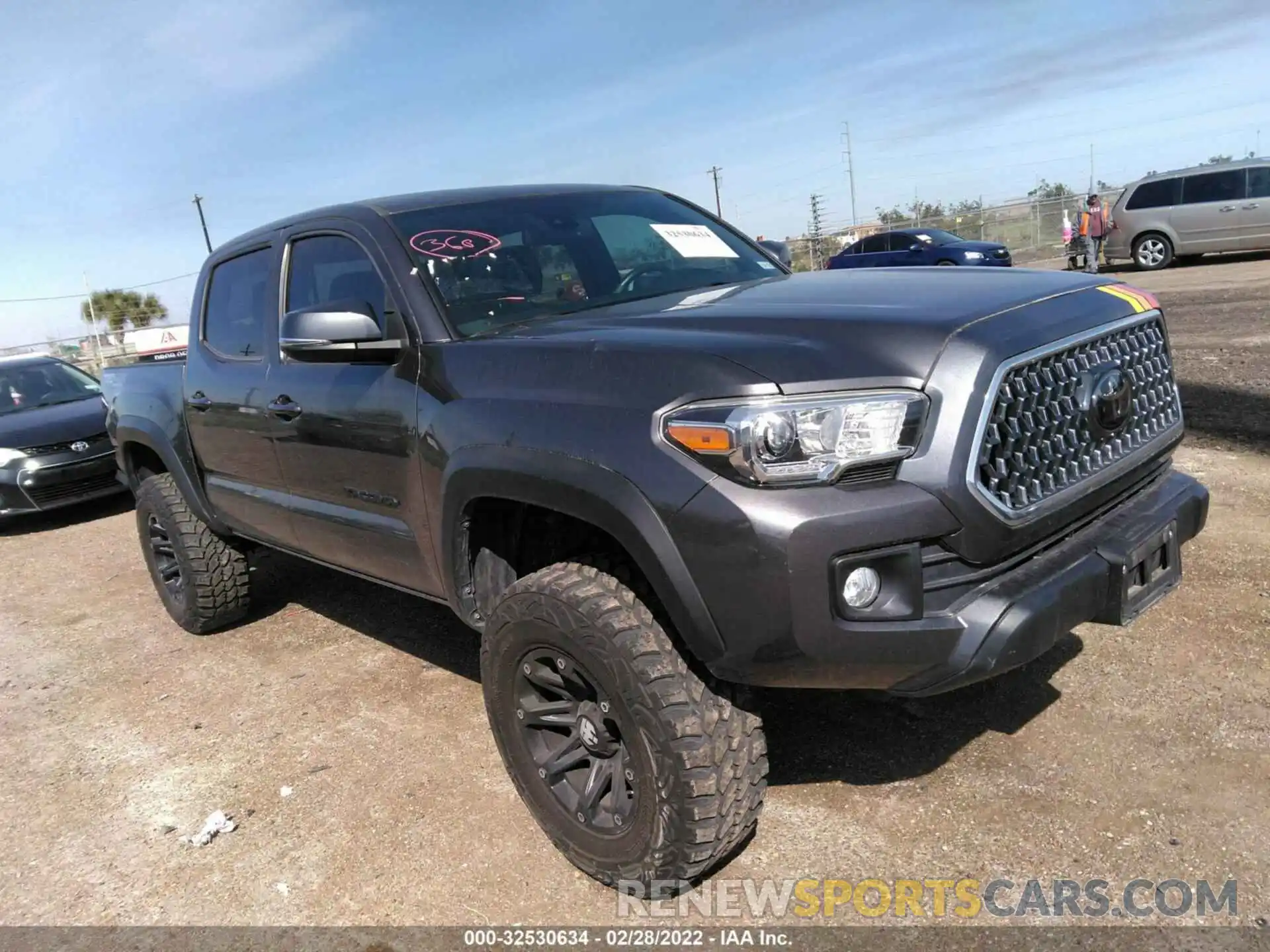 1 Photograph of a damaged car 5TFCZ5AN1KX209705 TOYOTA TACOMA 4WD 2019