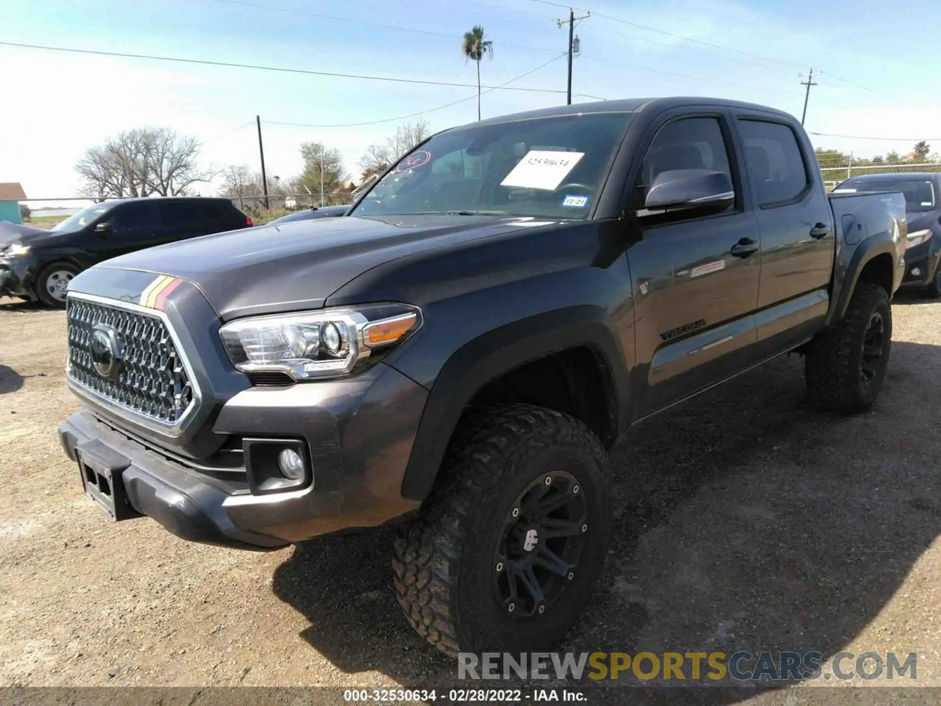 2 Photograph of a damaged car 5TFCZ5AN1KX209705 TOYOTA TACOMA 4WD 2019