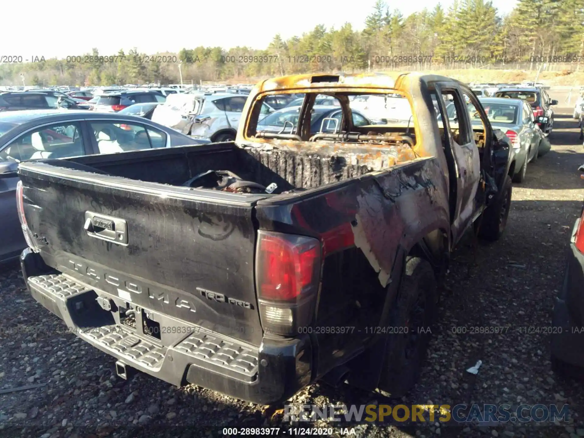 4 Photograph of a damaged car 5TFCZ5AN1KX210773 TOYOTA TACOMA 4WD 2019