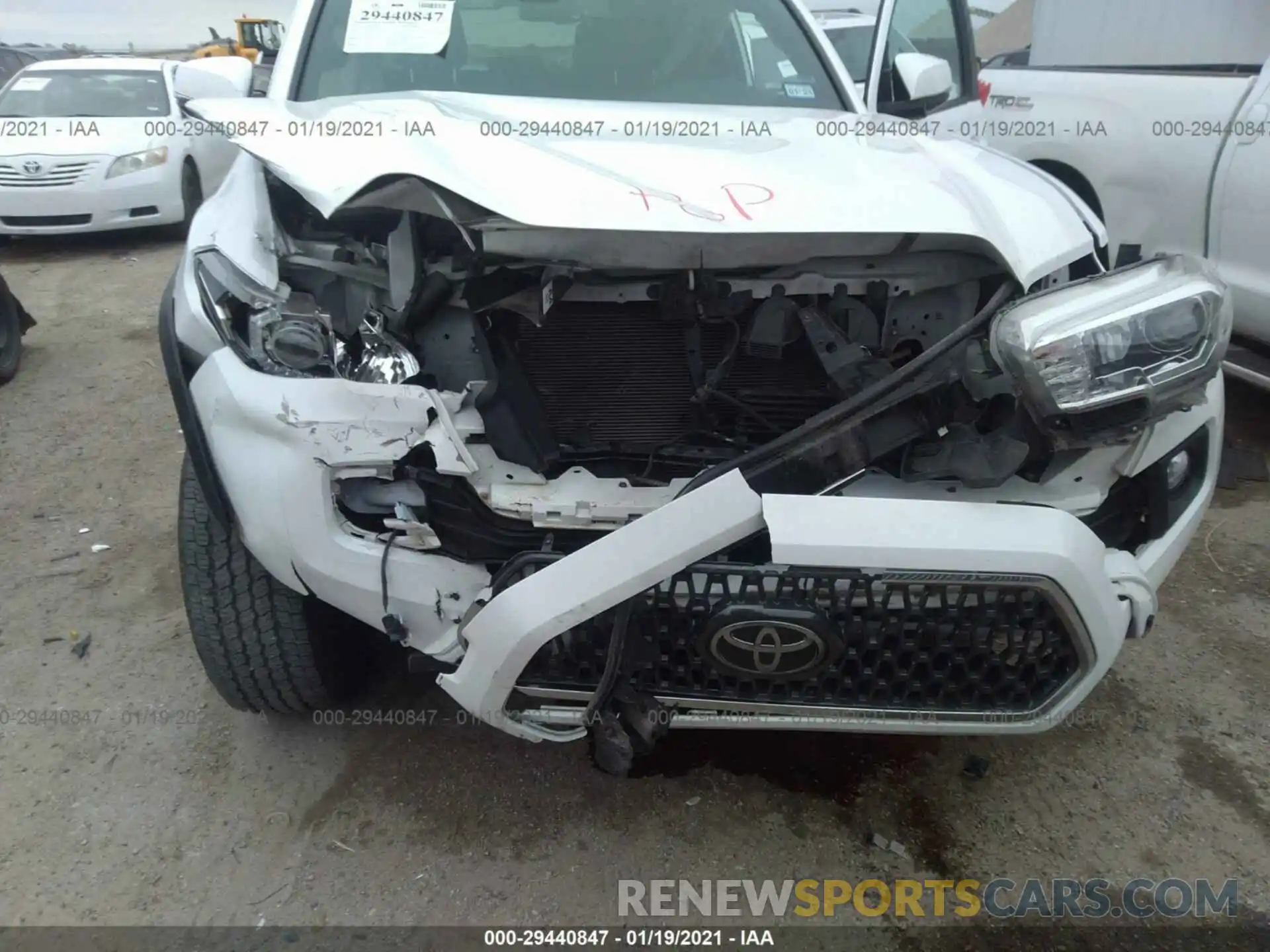 6 Photograph of a damaged car 5TFCZ5AN2KX186452 TOYOTA TACOMA 4WD 2019