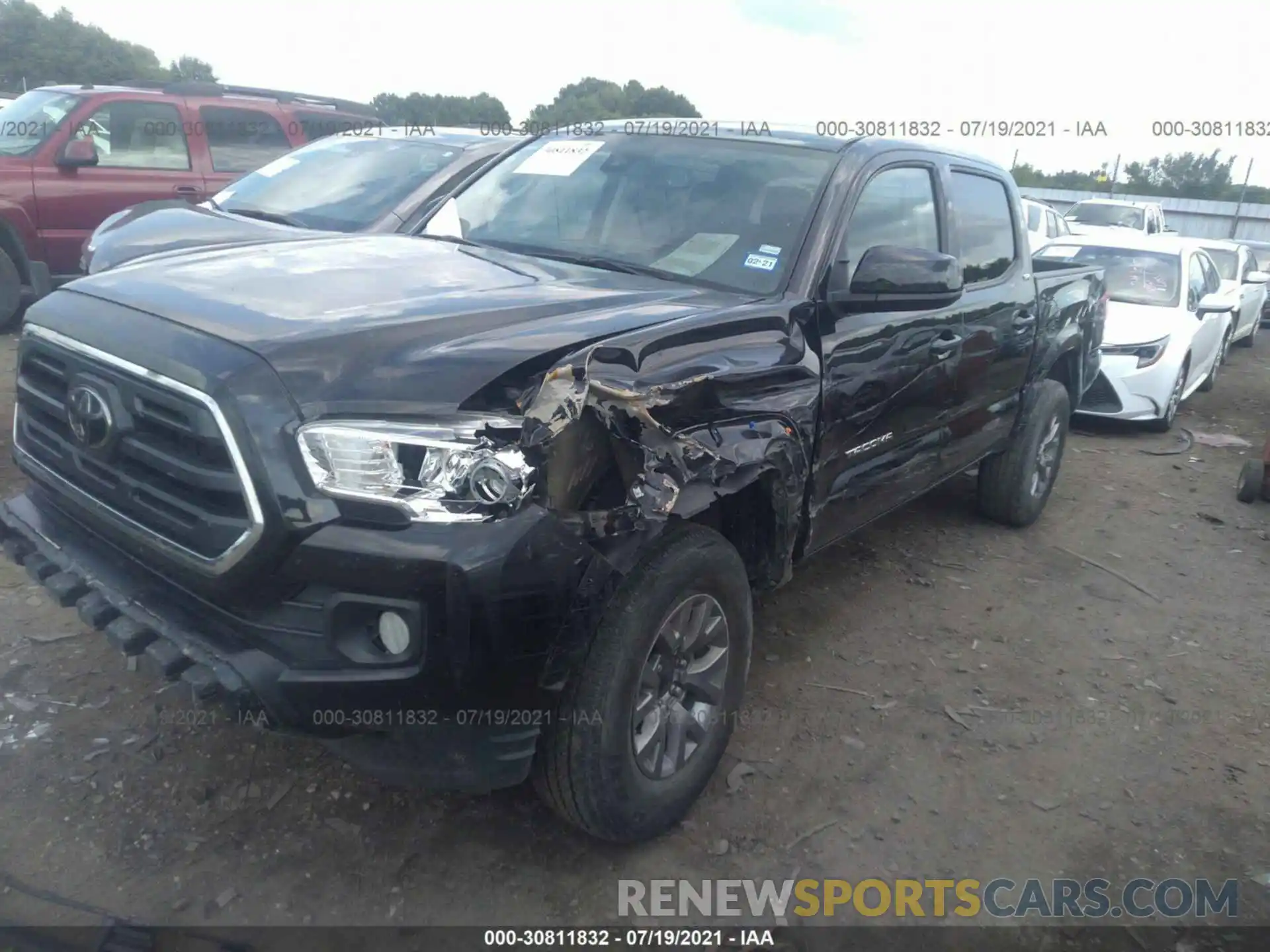 2 Photograph of a damaged car 5TFCZ5AN2KX190291 TOYOTA TACOMA 4WD 2019