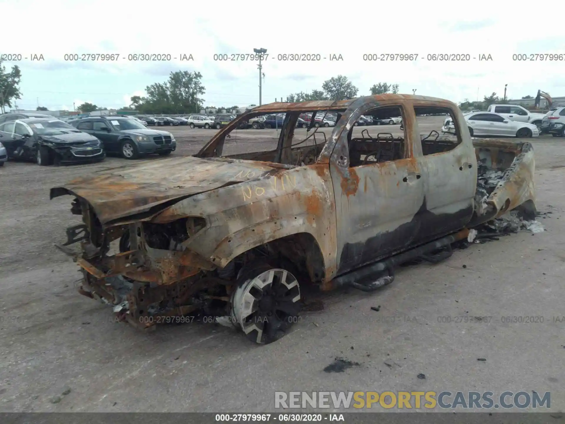 2 Photograph of a damaged car 5TFCZ5AN2KX194616 TOYOTA TACOMA 4WD 2019