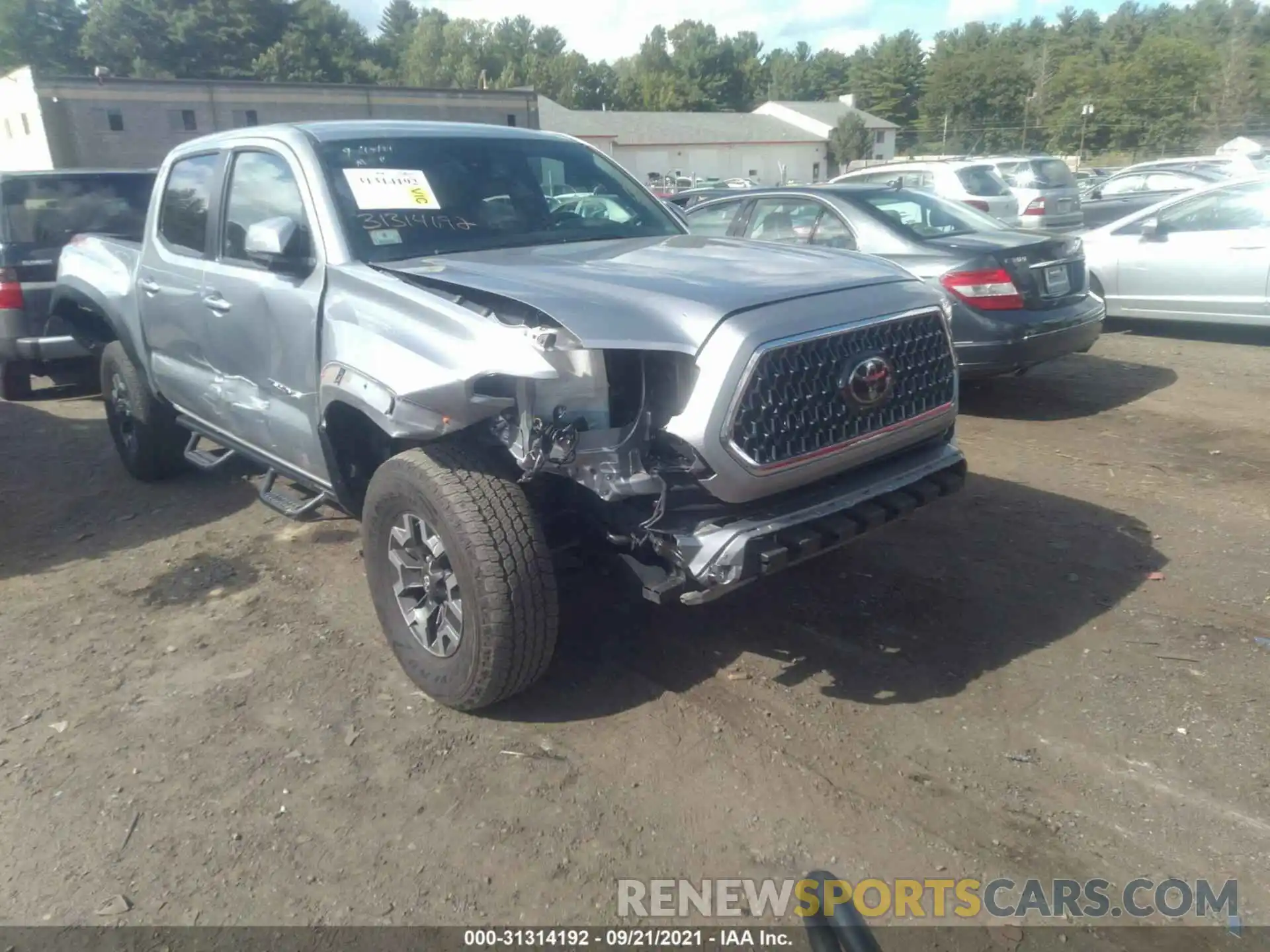 1 Photograph of a damaged car 5TFCZ5AN2KX195412 TOYOTA TACOMA 4WD 2019