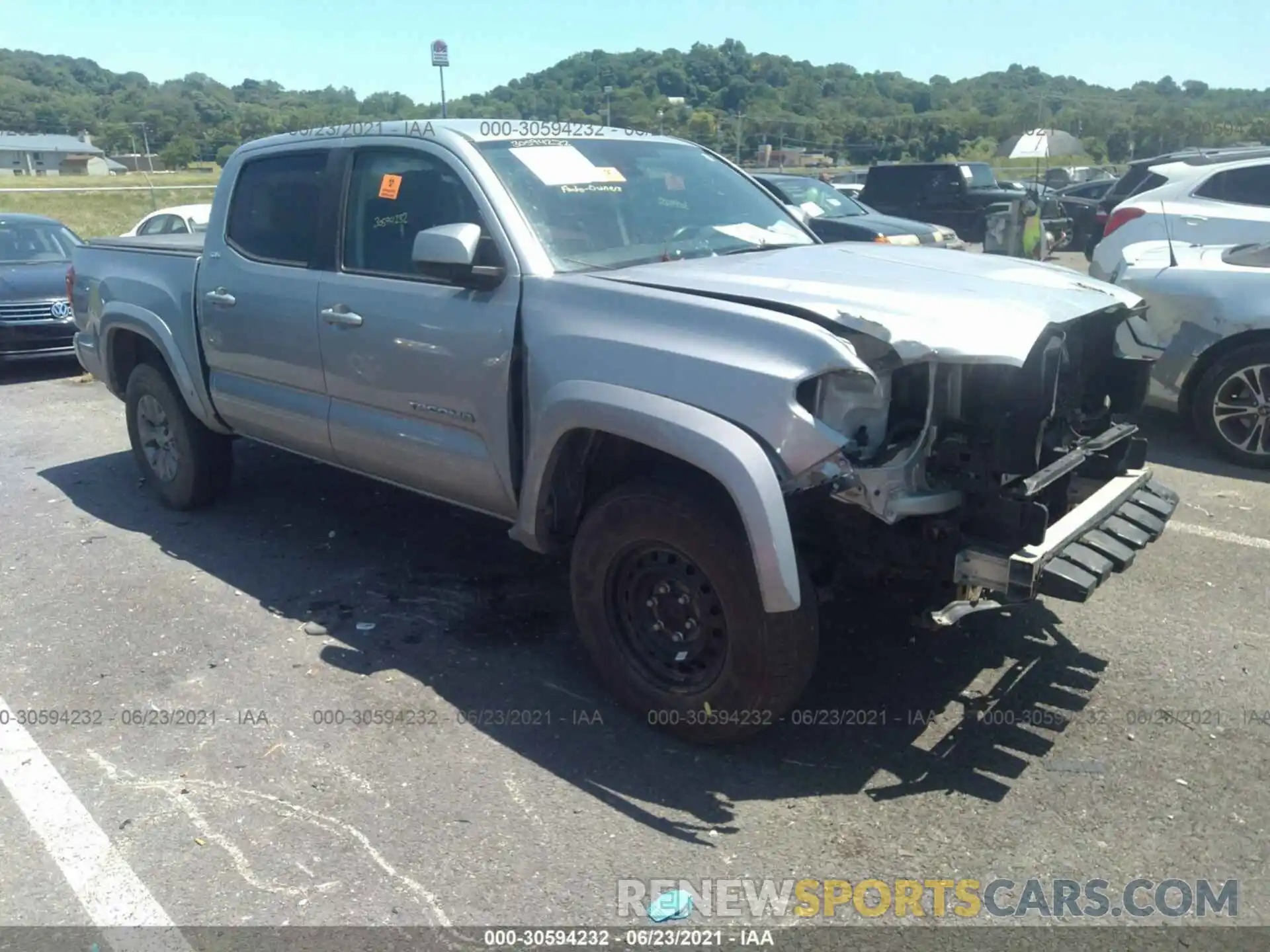 1 Photograph of a damaged car 5TFCZ5AN3KX180983 TOYOTA TACOMA 4WD 2019