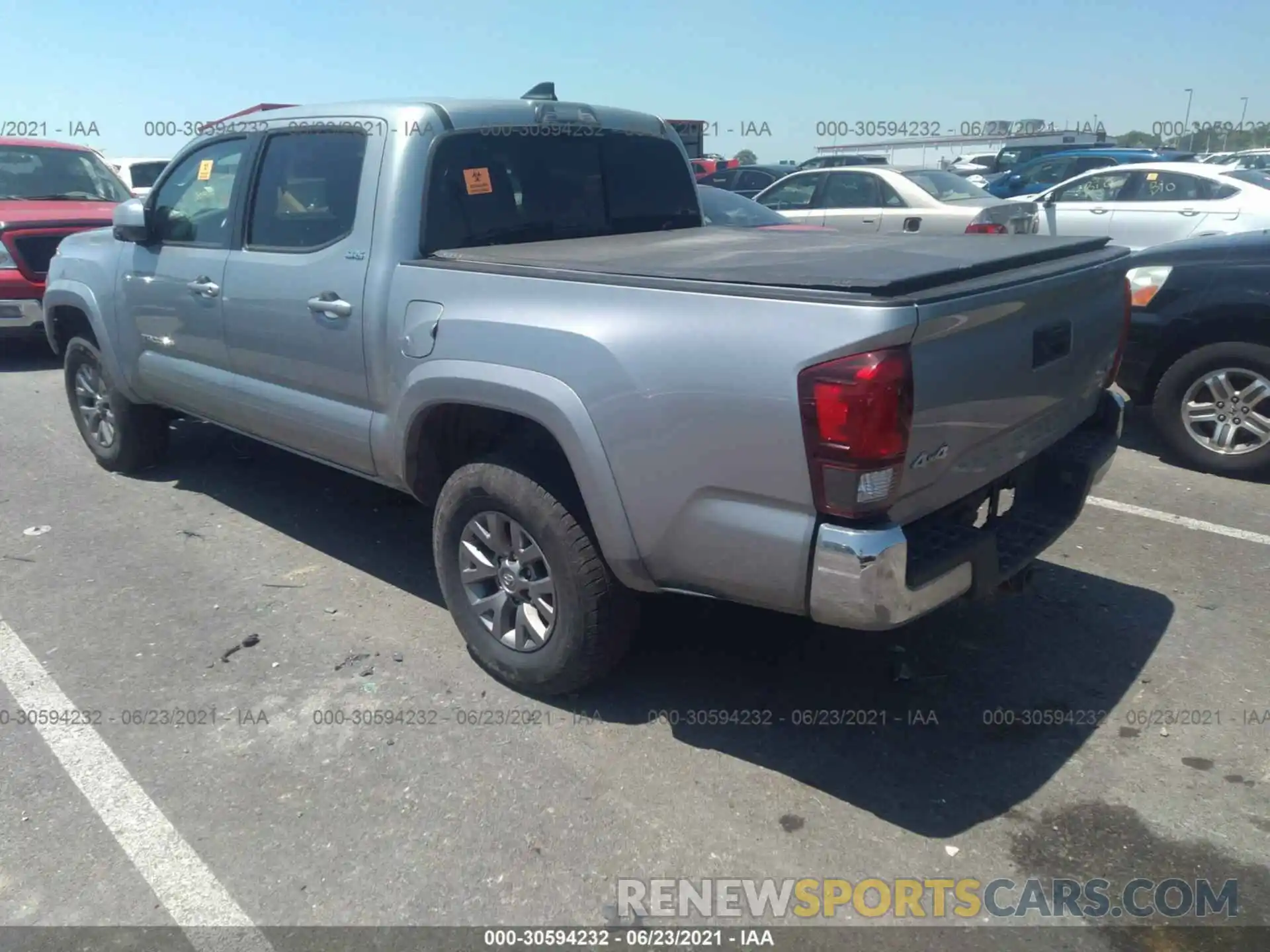 3 Photograph of a damaged car 5TFCZ5AN3KX180983 TOYOTA TACOMA 4WD 2019