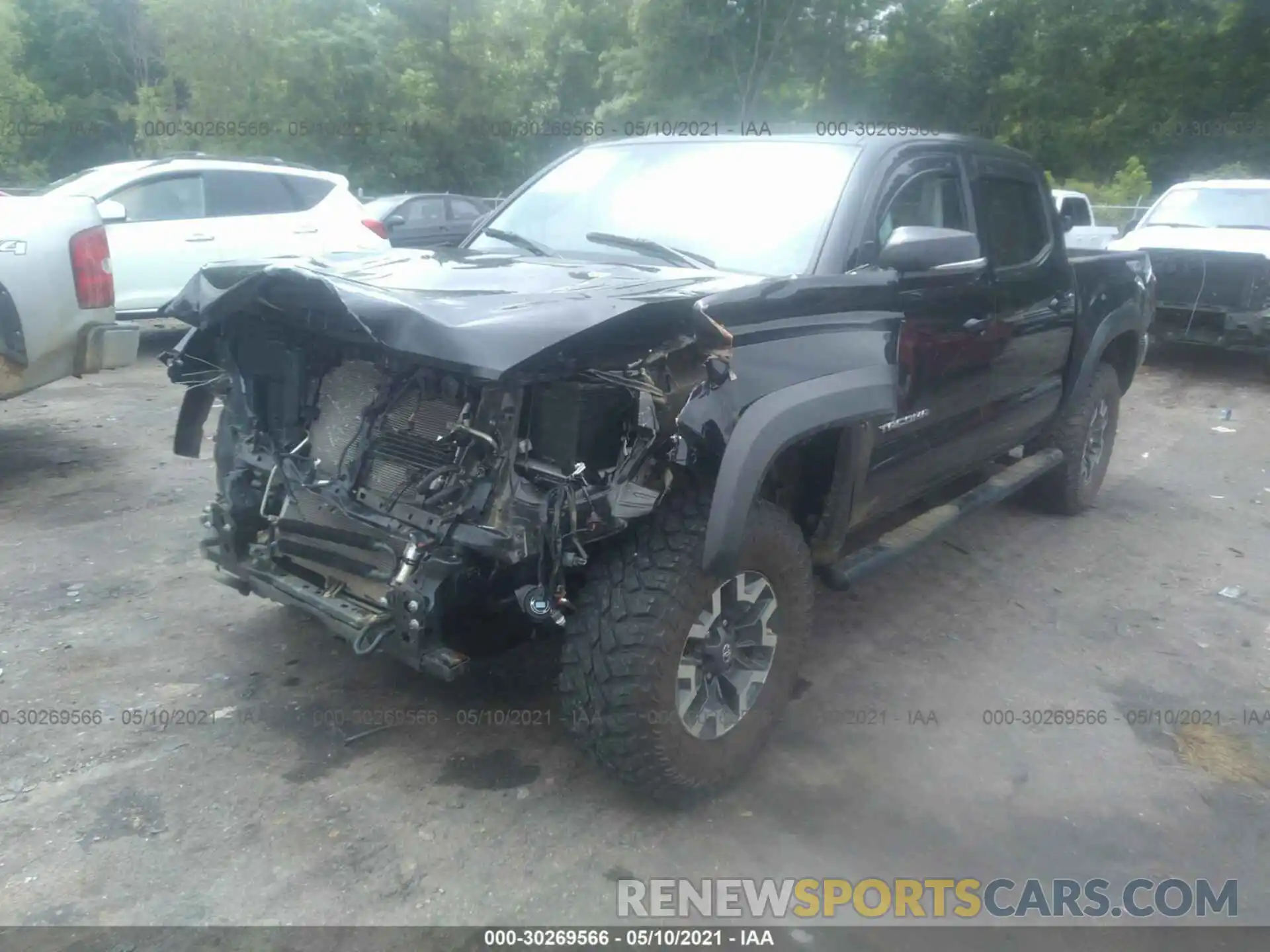 2 Photograph of a damaged car 5TFCZ5AN3KX182409 TOYOTA TACOMA 4WD 2019