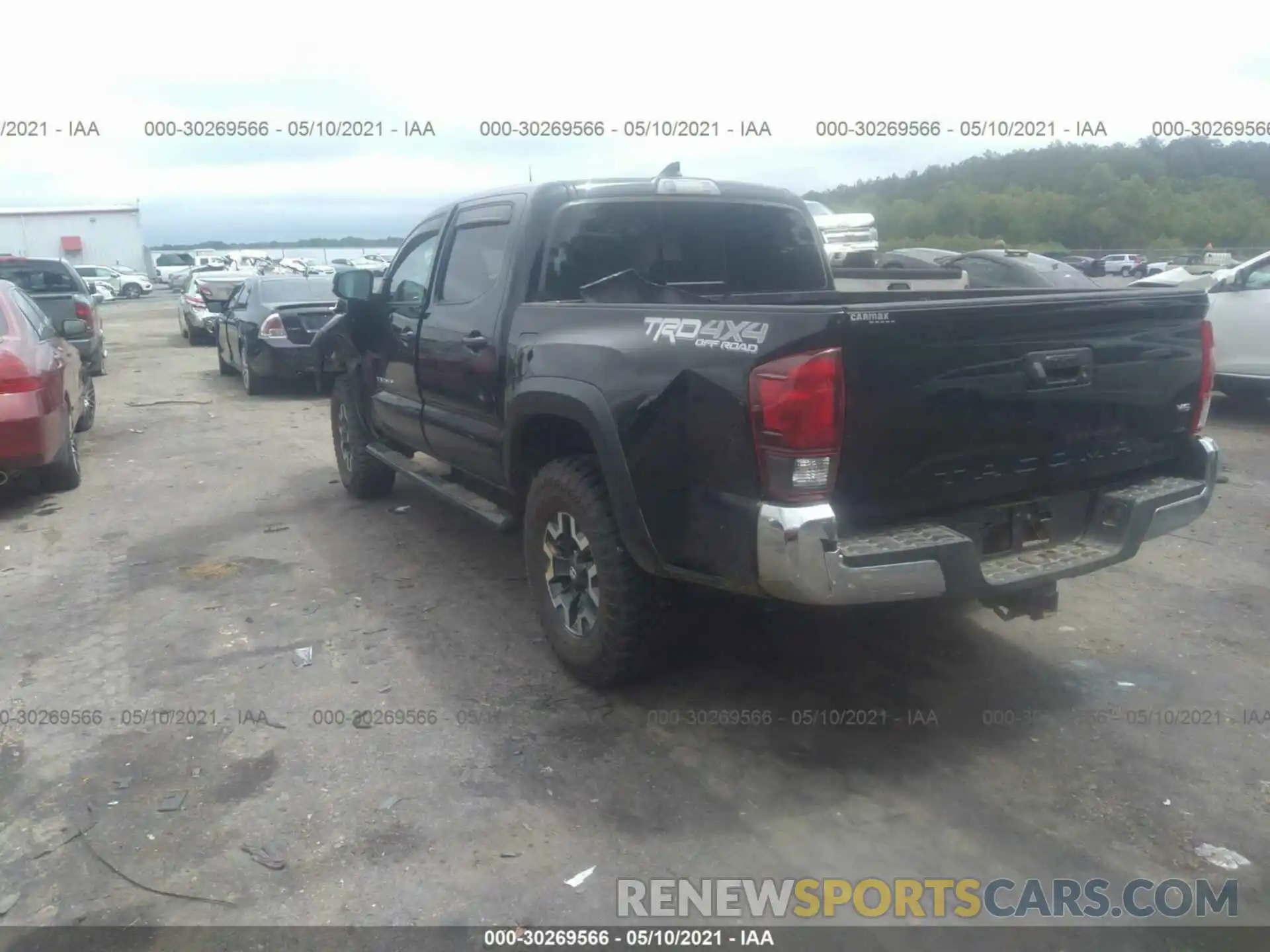 3 Photograph of a damaged car 5TFCZ5AN3KX182409 TOYOTA TACOMA 4WD 2019