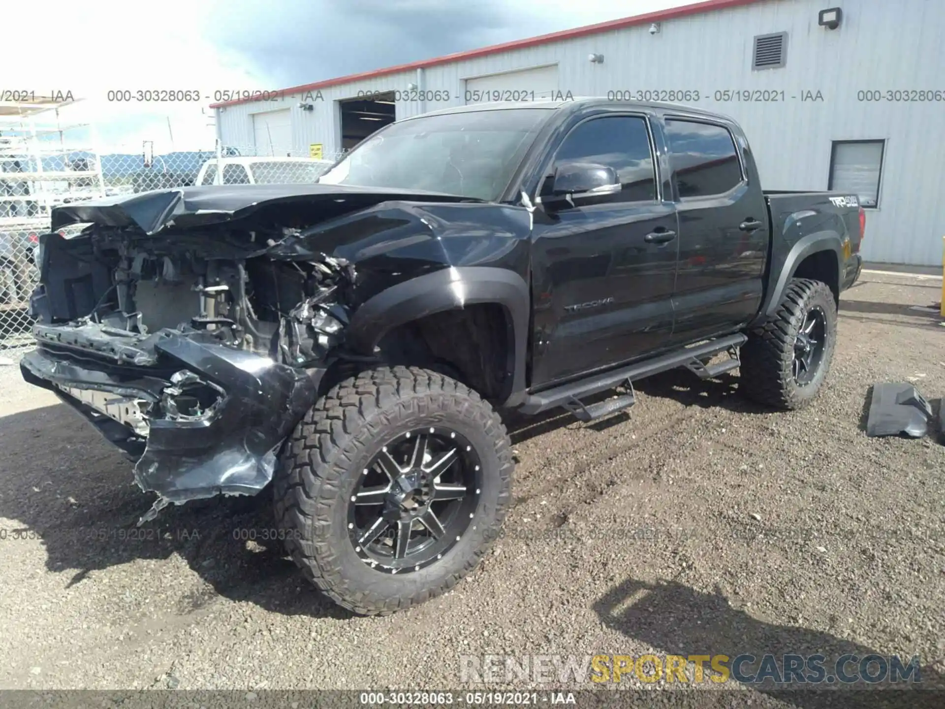 2 Photograph of a damaged car 5TFCZ5AN3KX183852 TOYOTA TACOMA 4WD 2019