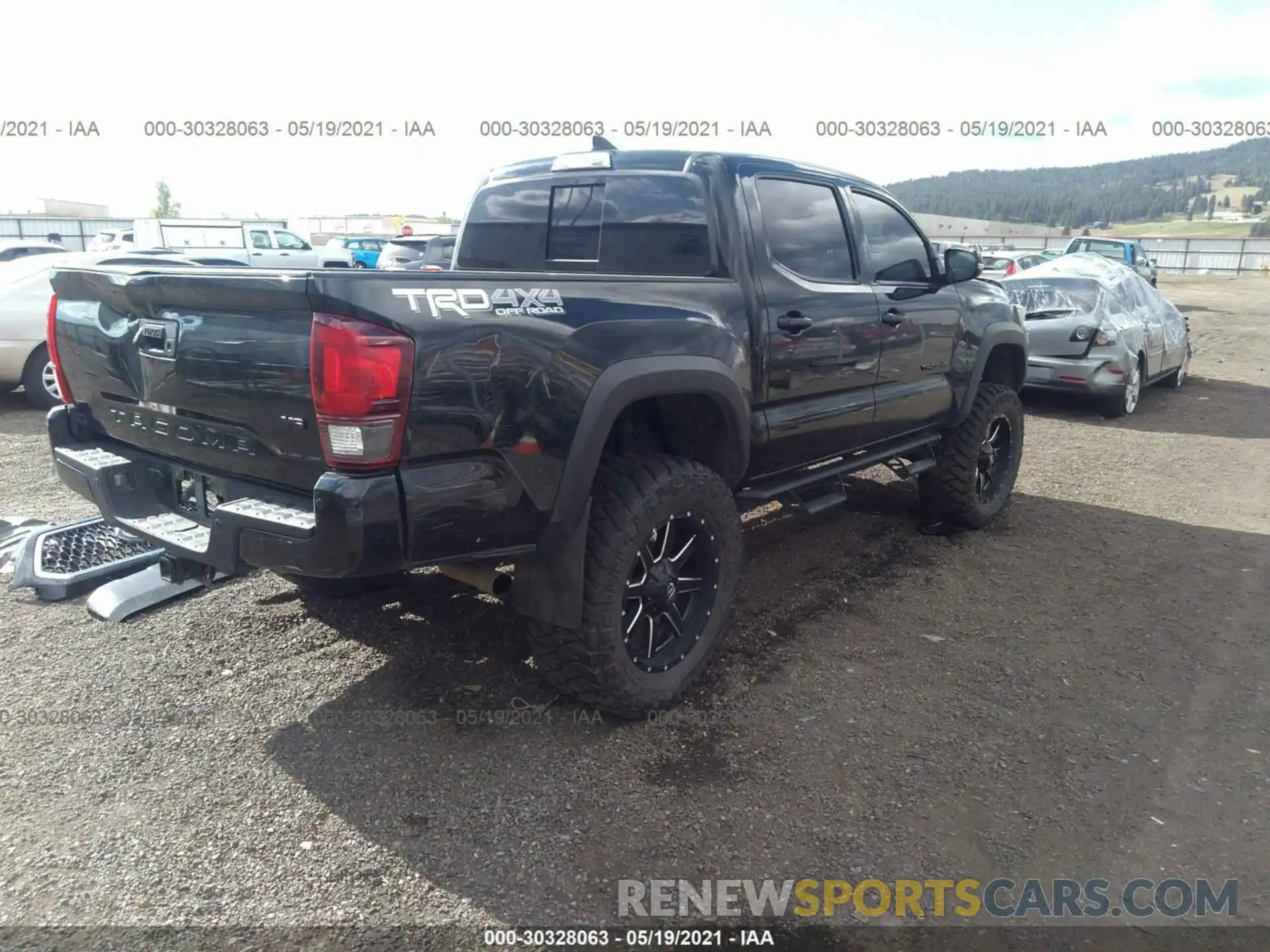 4 Фотография поврежденного автомобиля 5TFCZ5AN3KX183852 TOYOTA TACOMA 4WD 2019