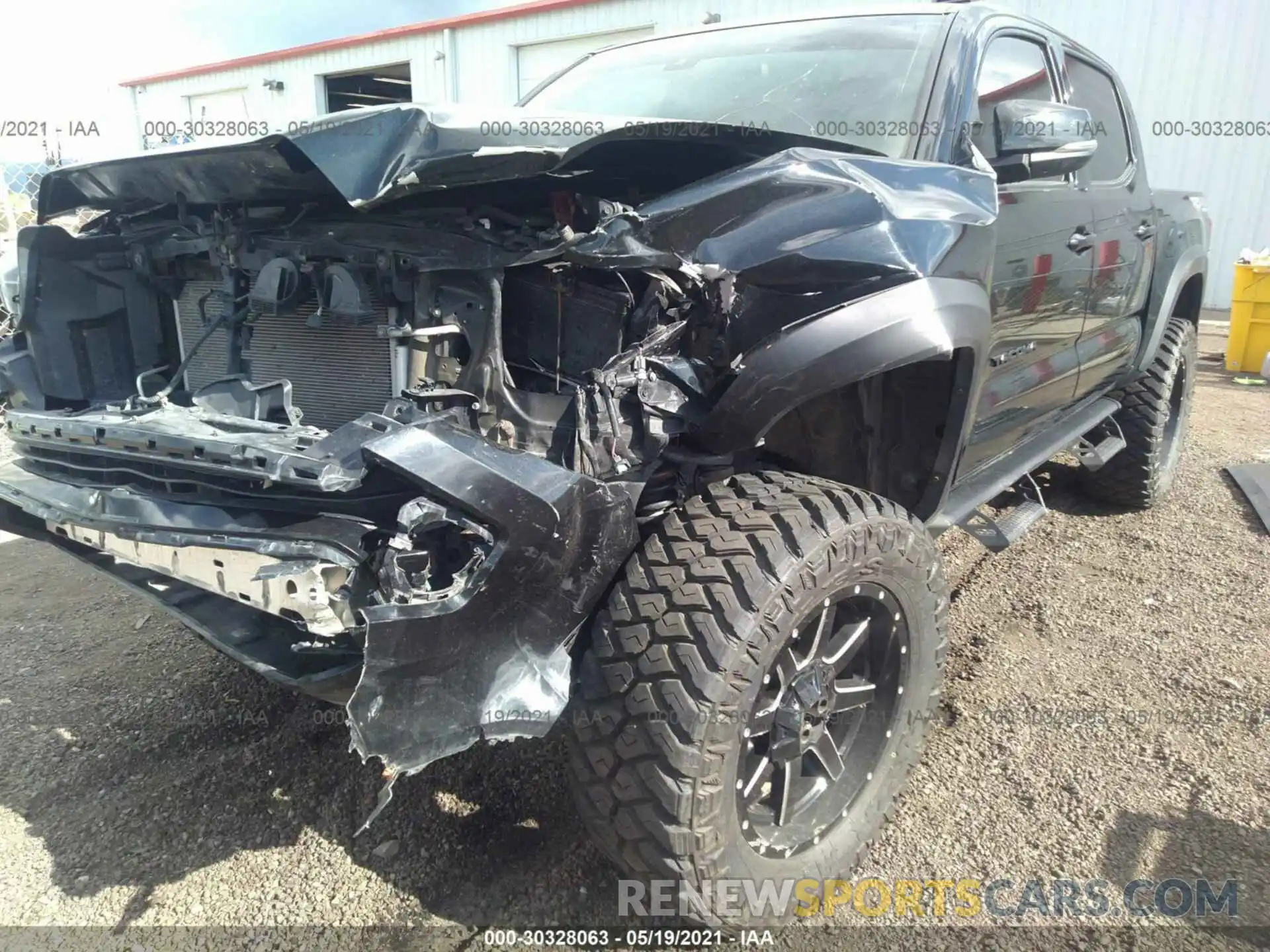 6 Photograph of a damaged car 5TFCZ5AN3KX183852 TOYOTA TACOMA 4WD 2019