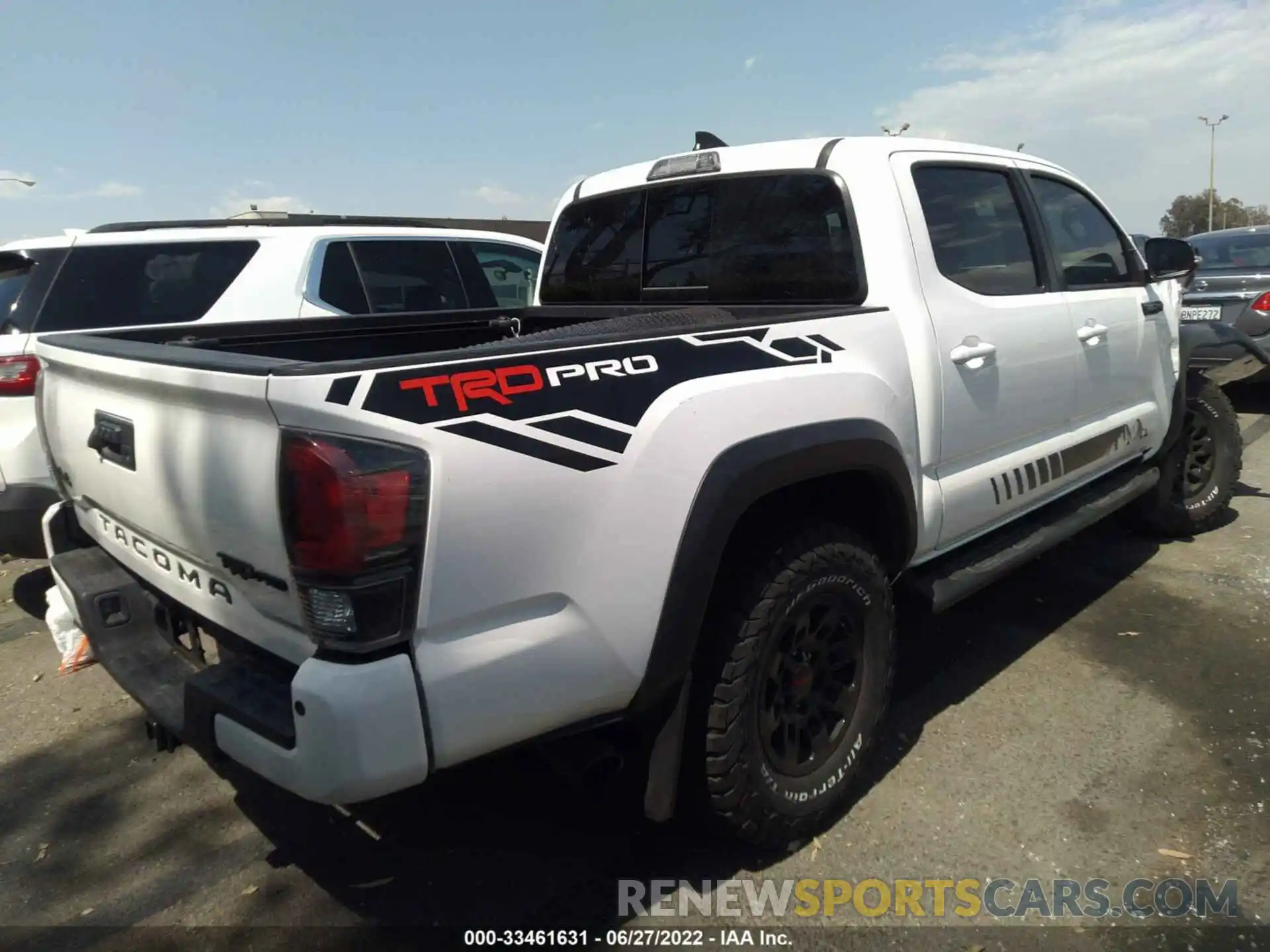 4 Photograph of a damaged car 5TFCZ5AN3KX190803 TOYOTA TACOMA 4WD 2019