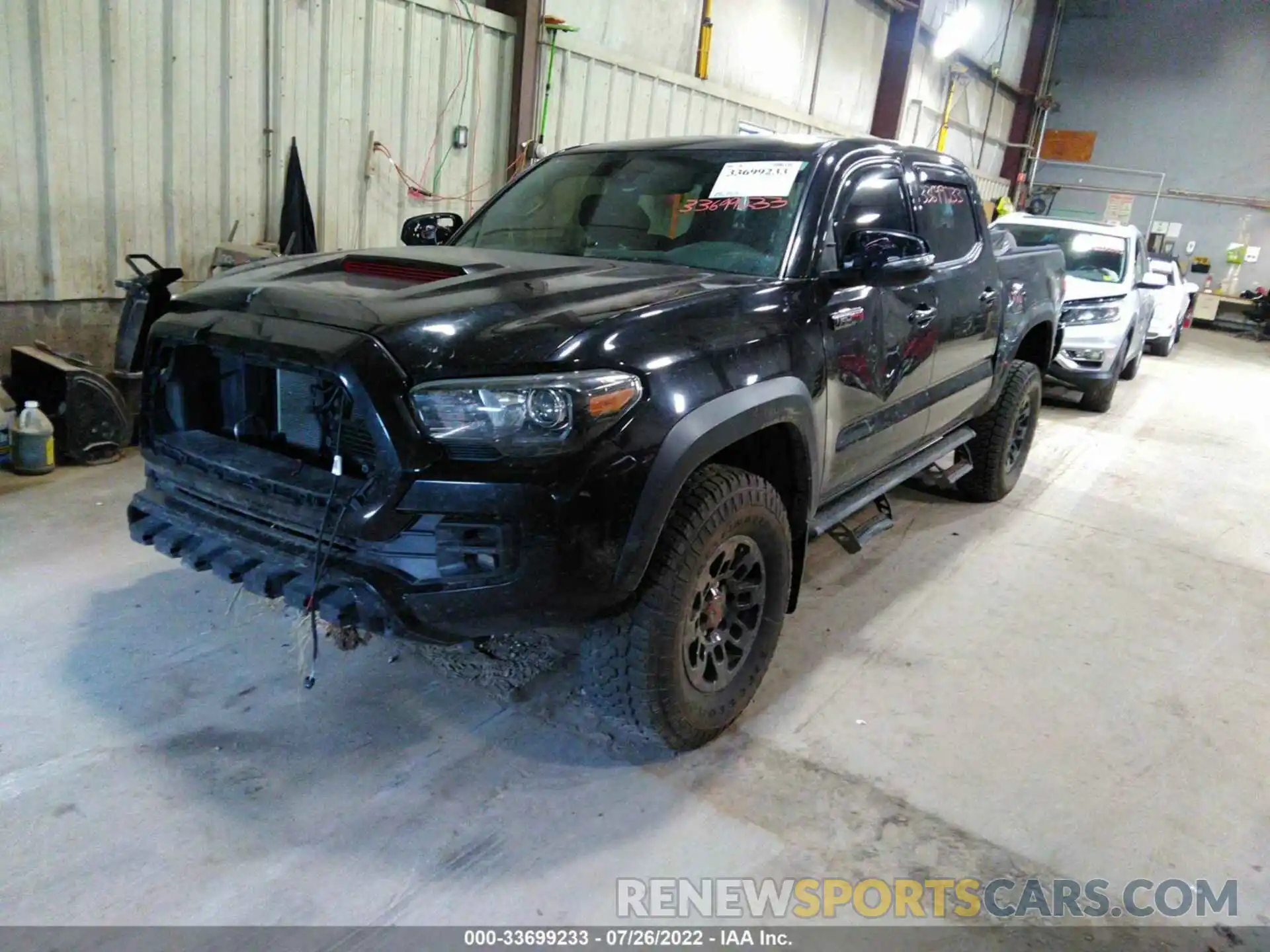 2 Photograph of a damaged car 5TFCZ5AN3KX193779 TOYOTA TACOMA 4WD 2019