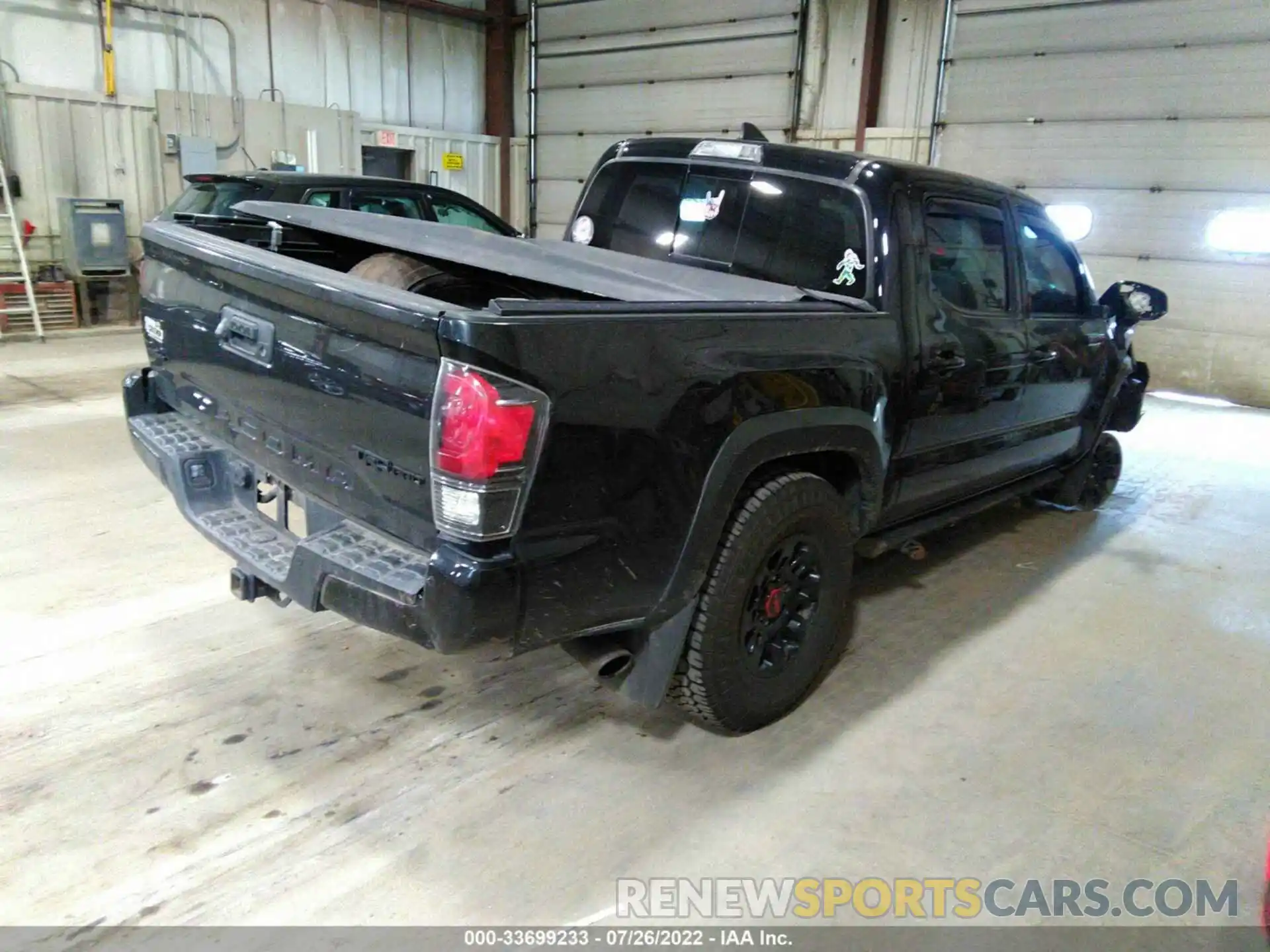 4 Photograph of a damaged car 5TFCZ5AN3KX193779 TOYOTA TACOMA 4WD 2019