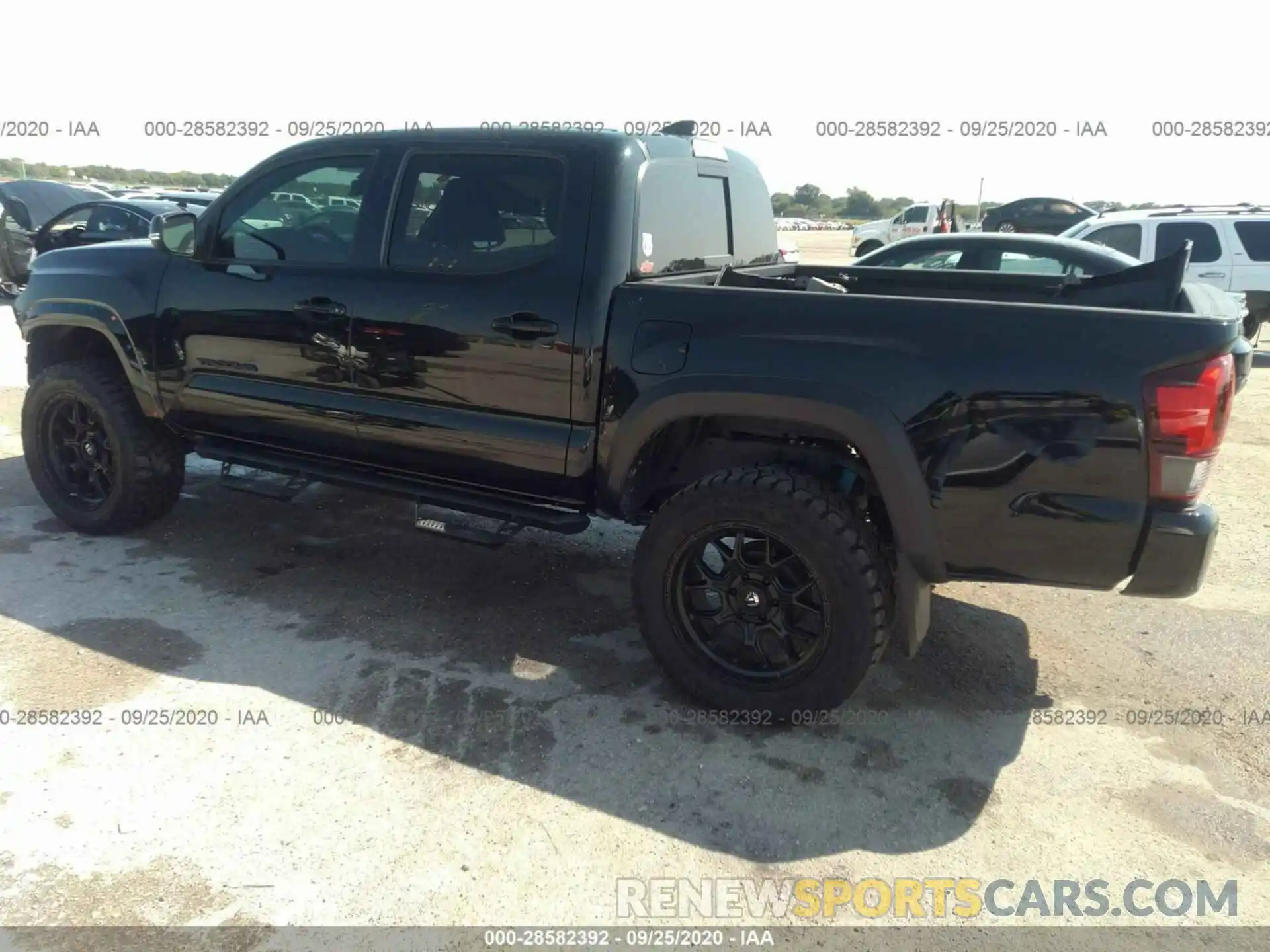 3 Photograph of a damaged car 5TFCZ5AN3KX194446 TOYOTA TACOMA 4WD 2019