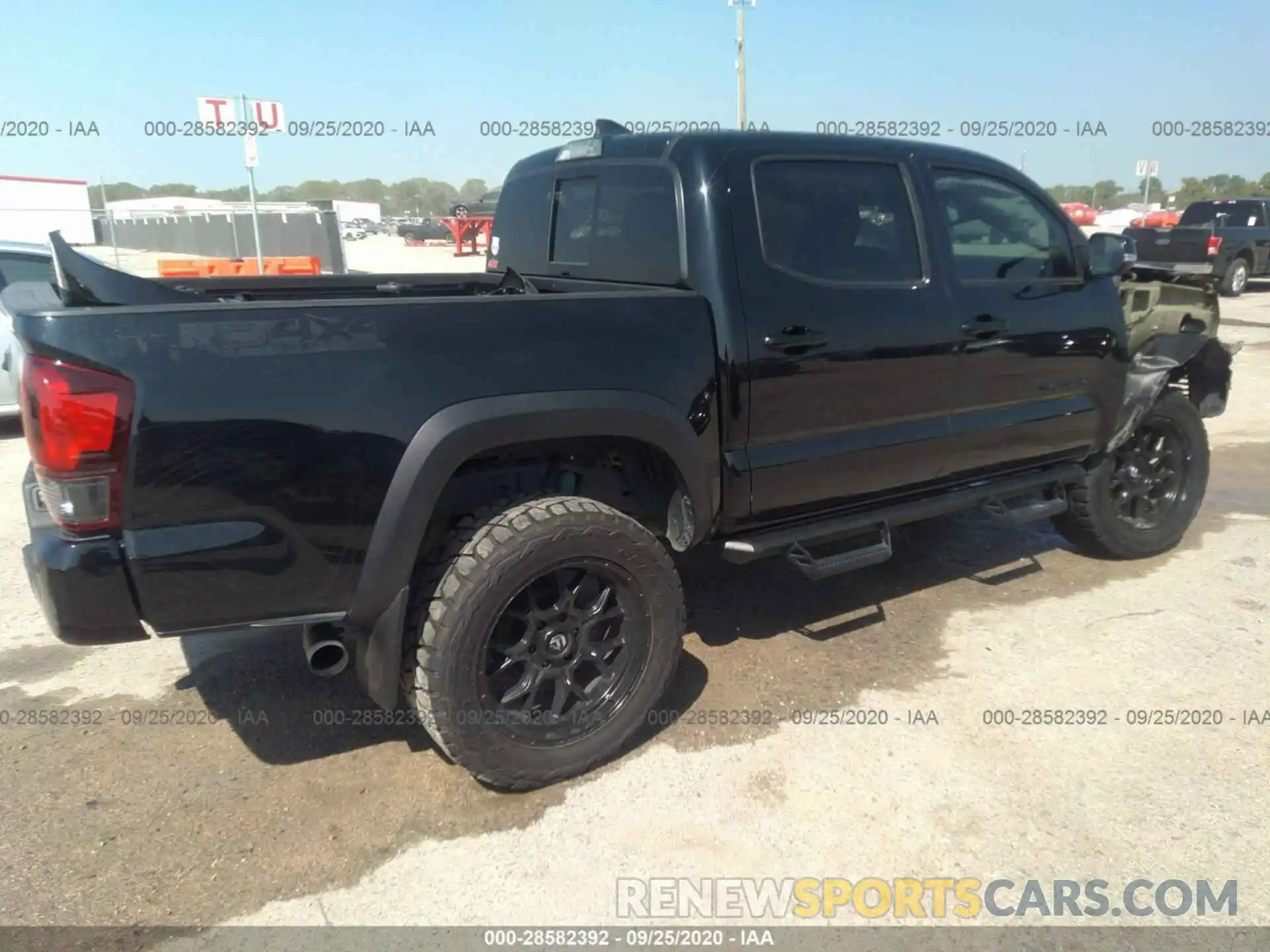 4 Photograph of a damaged car 5TFCZ5AN3KX194446 TOYOTA TACOMA 4WD 2019