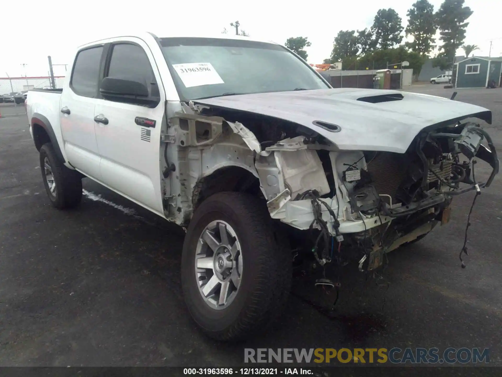 1 Photograph of a damaged car 5TFCZ5AN3KX203727 TOYOTA TACOMA 4WD 2019