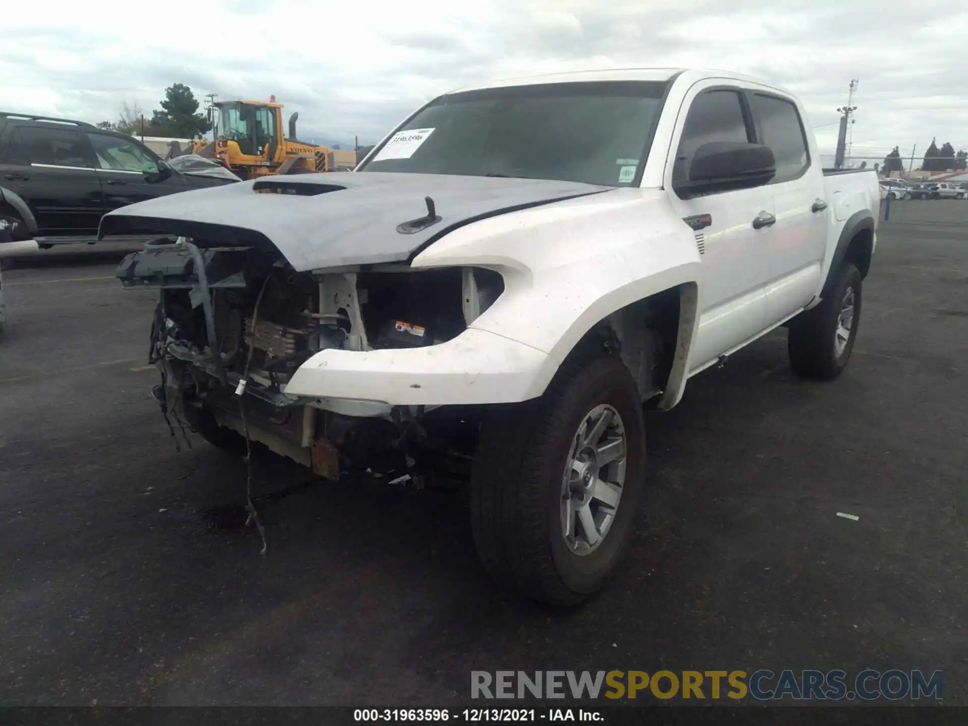 2 Photograph of a damaged car 5TFCZ5AN3KX203727 TOYOTA TACOMA 4WD 2019