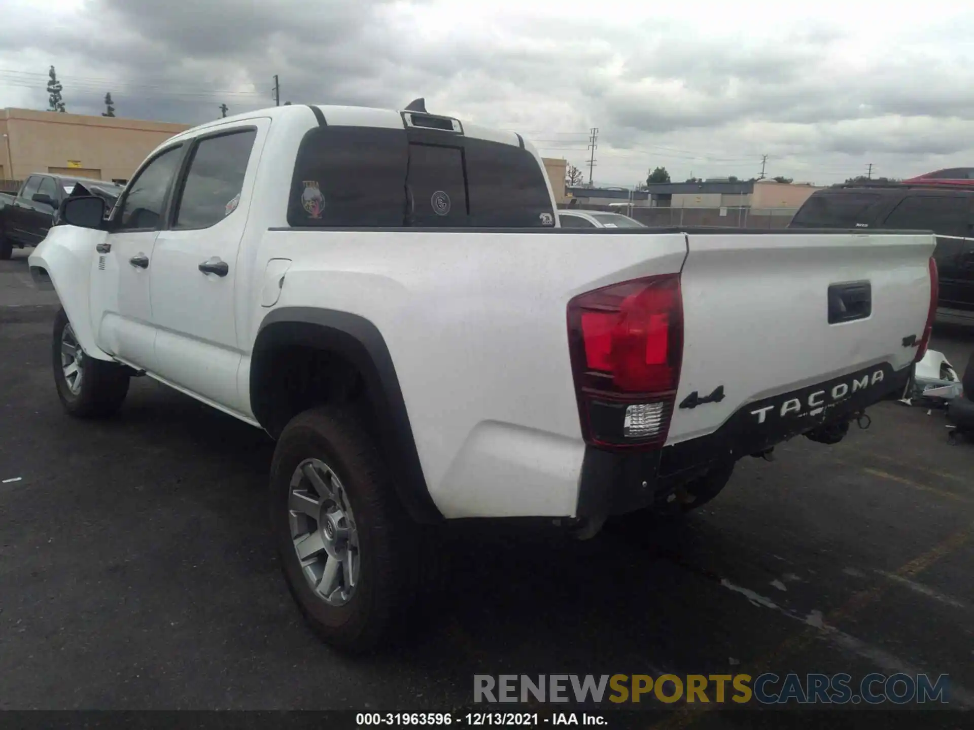 3 Photograph of a damaged car 5TFCZ5AN3KX203727 TOYOTA TACOMA 4WD 2019