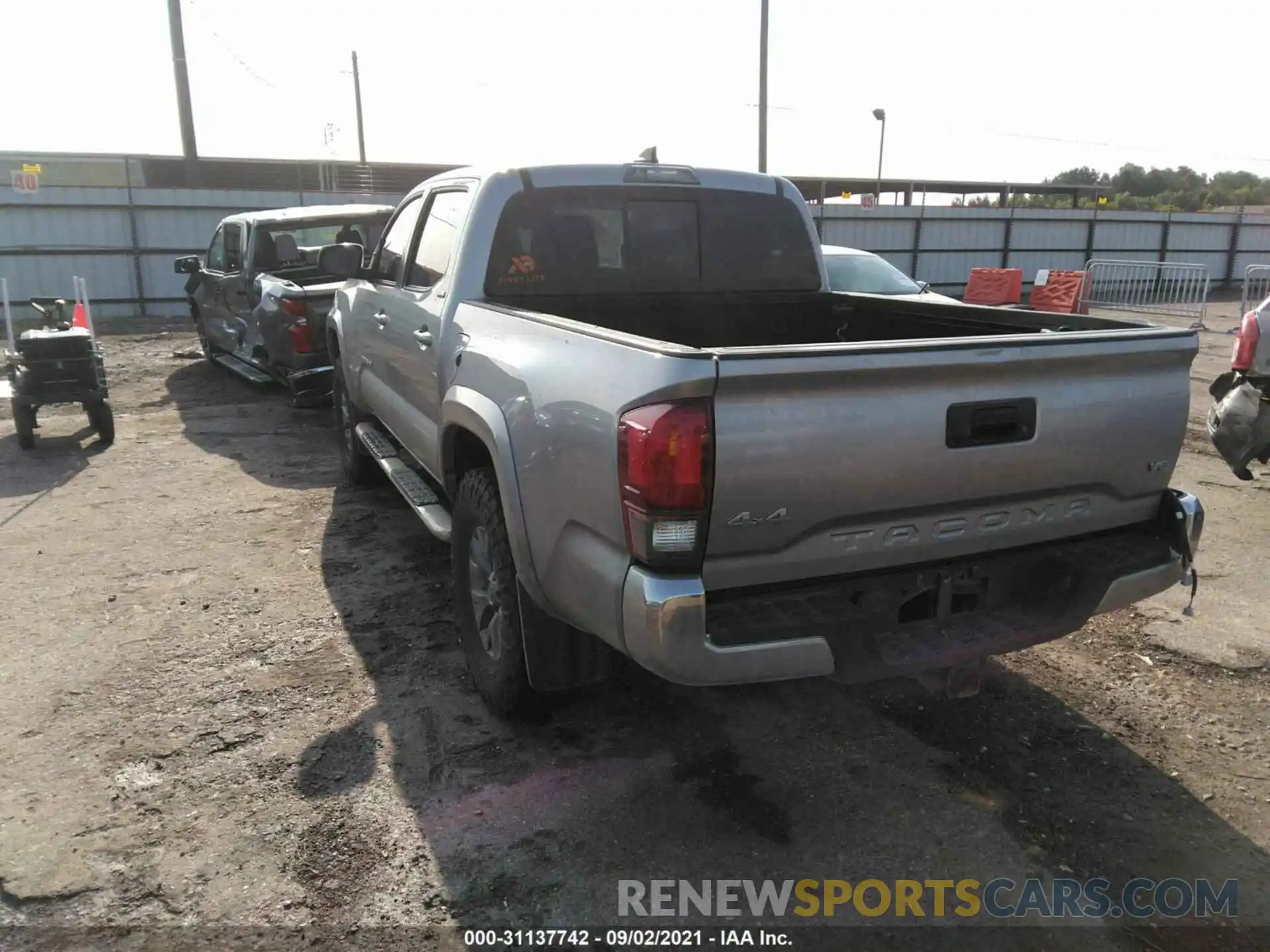 3 Photograph of a damaged car 5TFCZ5AN3KX209091 TOYOTA TACOMA 4WD 2019