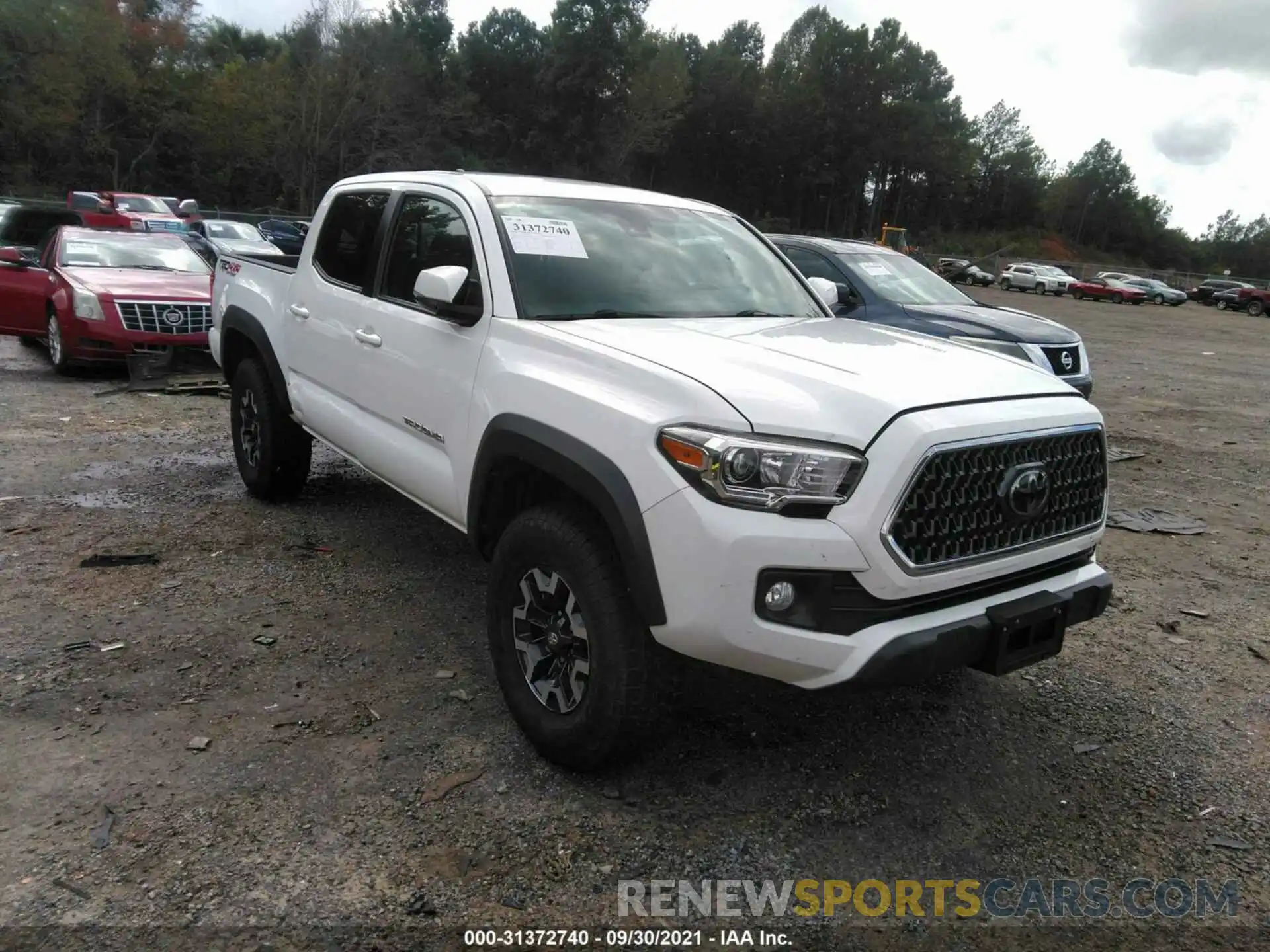 1 Photograph of a damaged car 5TFCZ5AN3KX211388 TOYOTA TACOMA 4WD 2019