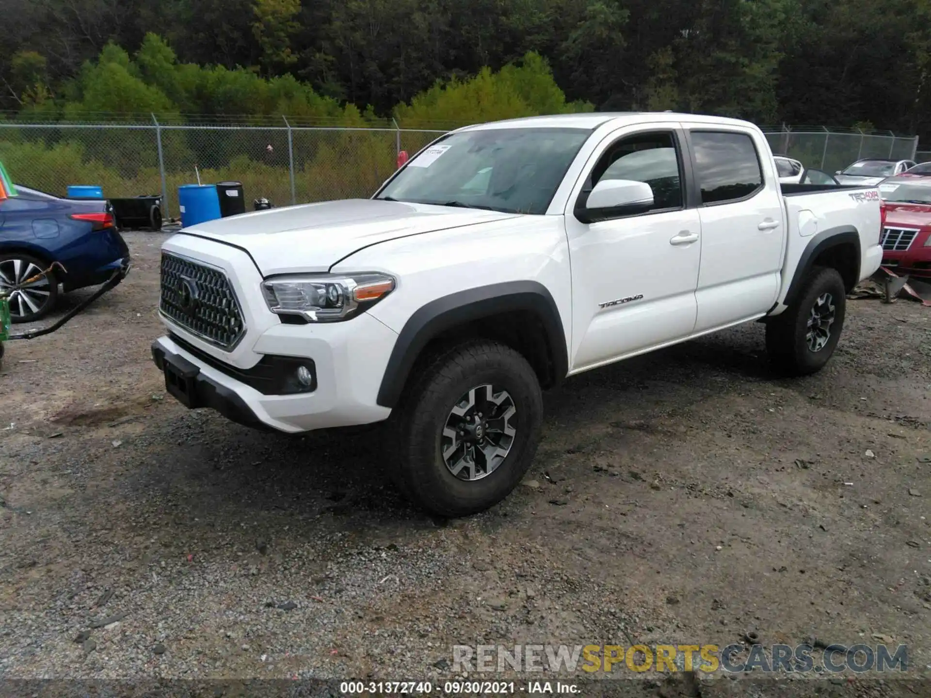 2 Photograph of a damaged car 5TFCZ5AN3KX211388 TOYOTA TACOMA 4WD 2019